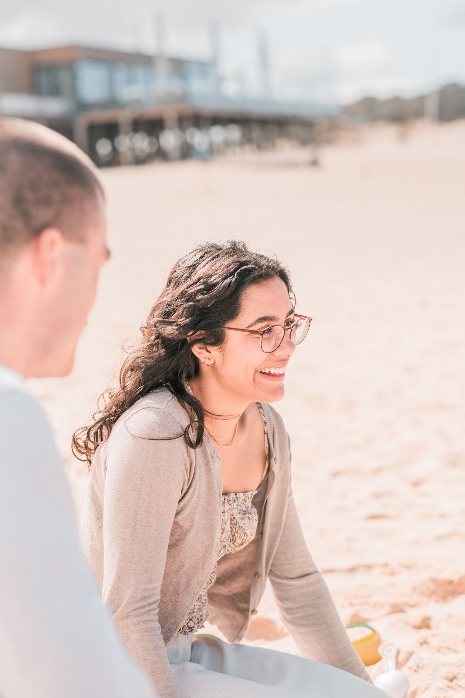 Natural and joyful family moments captured on a Portuguese beach.