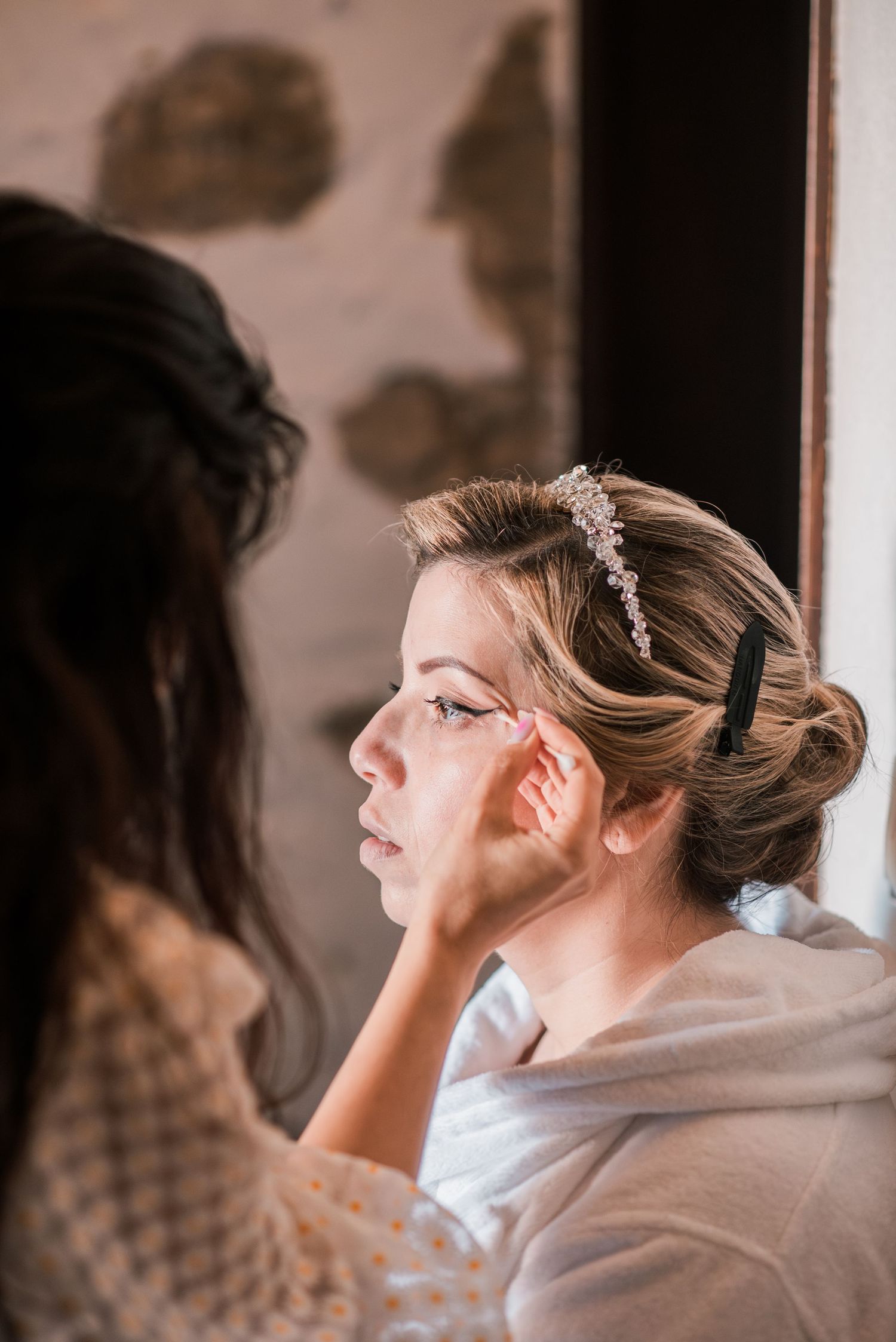 Elegant bride during destination wedding preparations in Óbidos, Portugal.