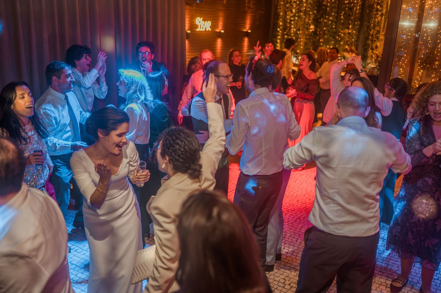 Winter wedding in Porto, Portugal, with Christmas lights and festive decorations in December.