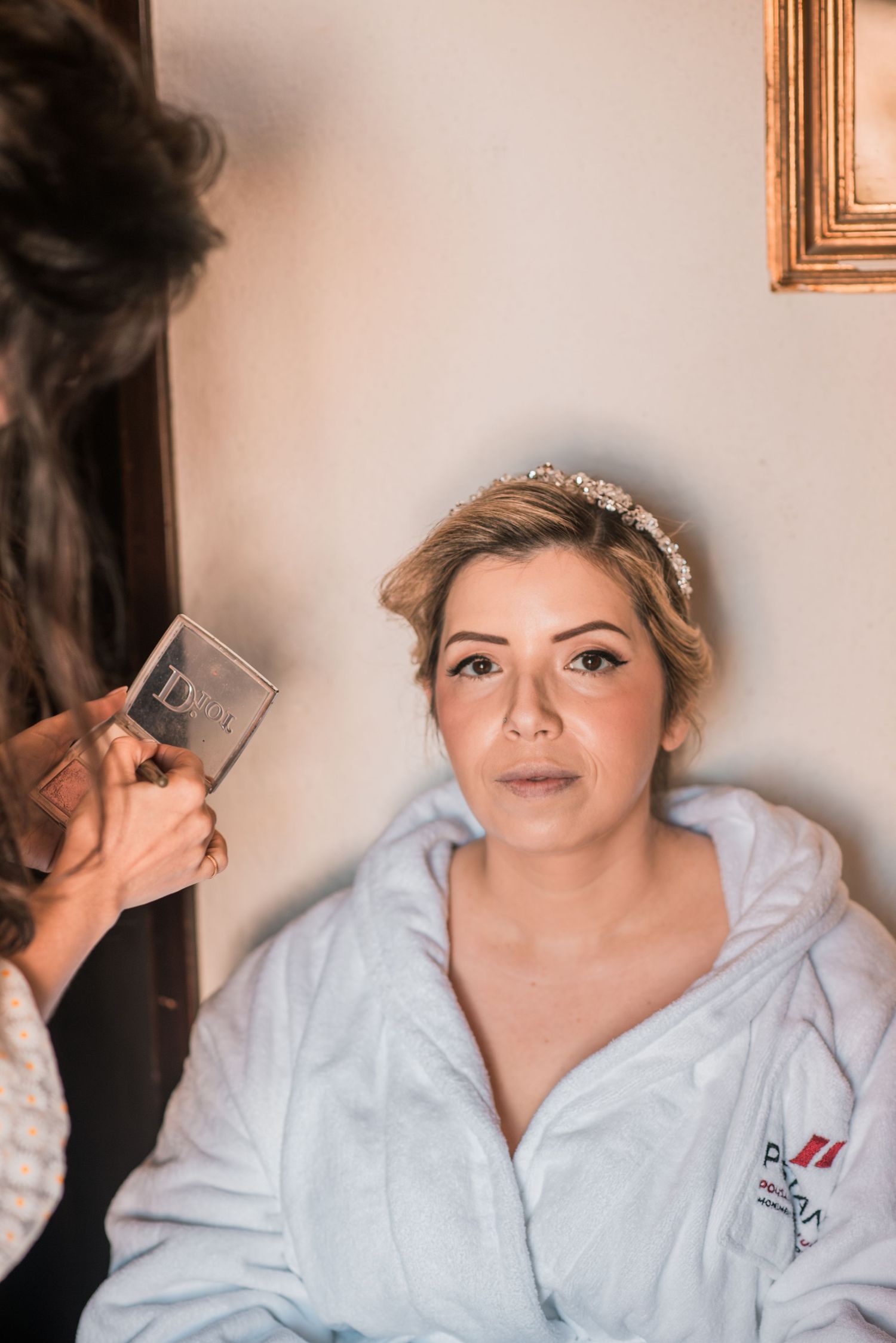 Elegant bride during destination wedding preparations in Óbidos, Portugal.