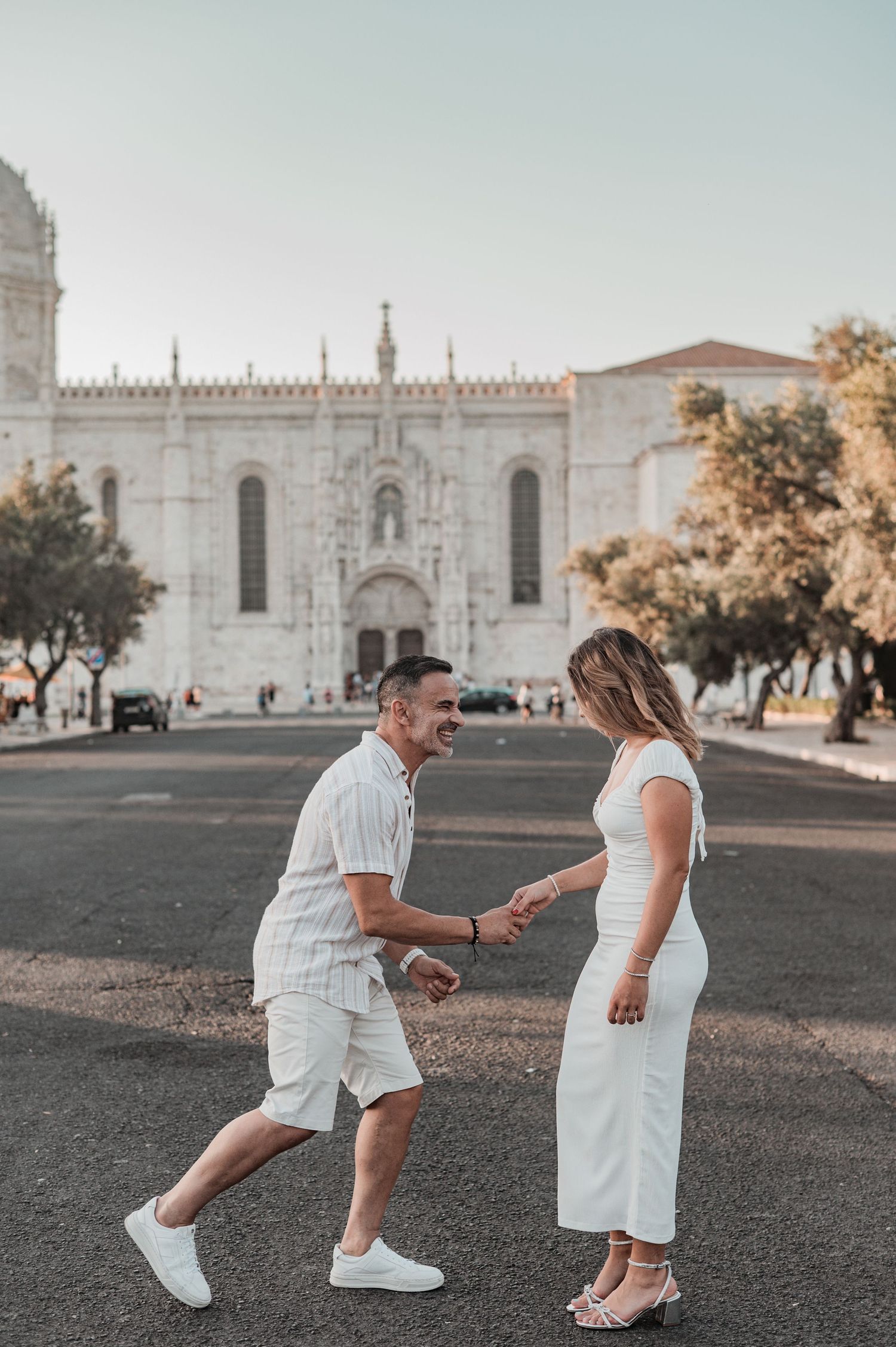 Pre-wedding photography in Belém, Lisbon, with candid moments of love and connection.