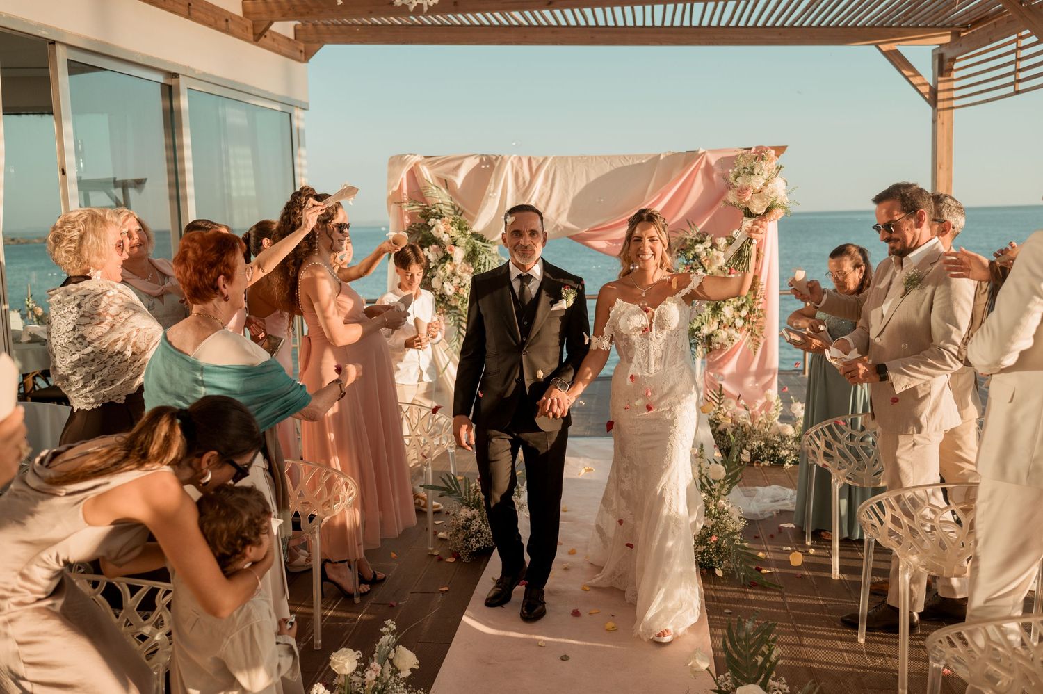Seaside wedding in Parede, Portugal, with ocean views and golden sunset light near Lisbon.