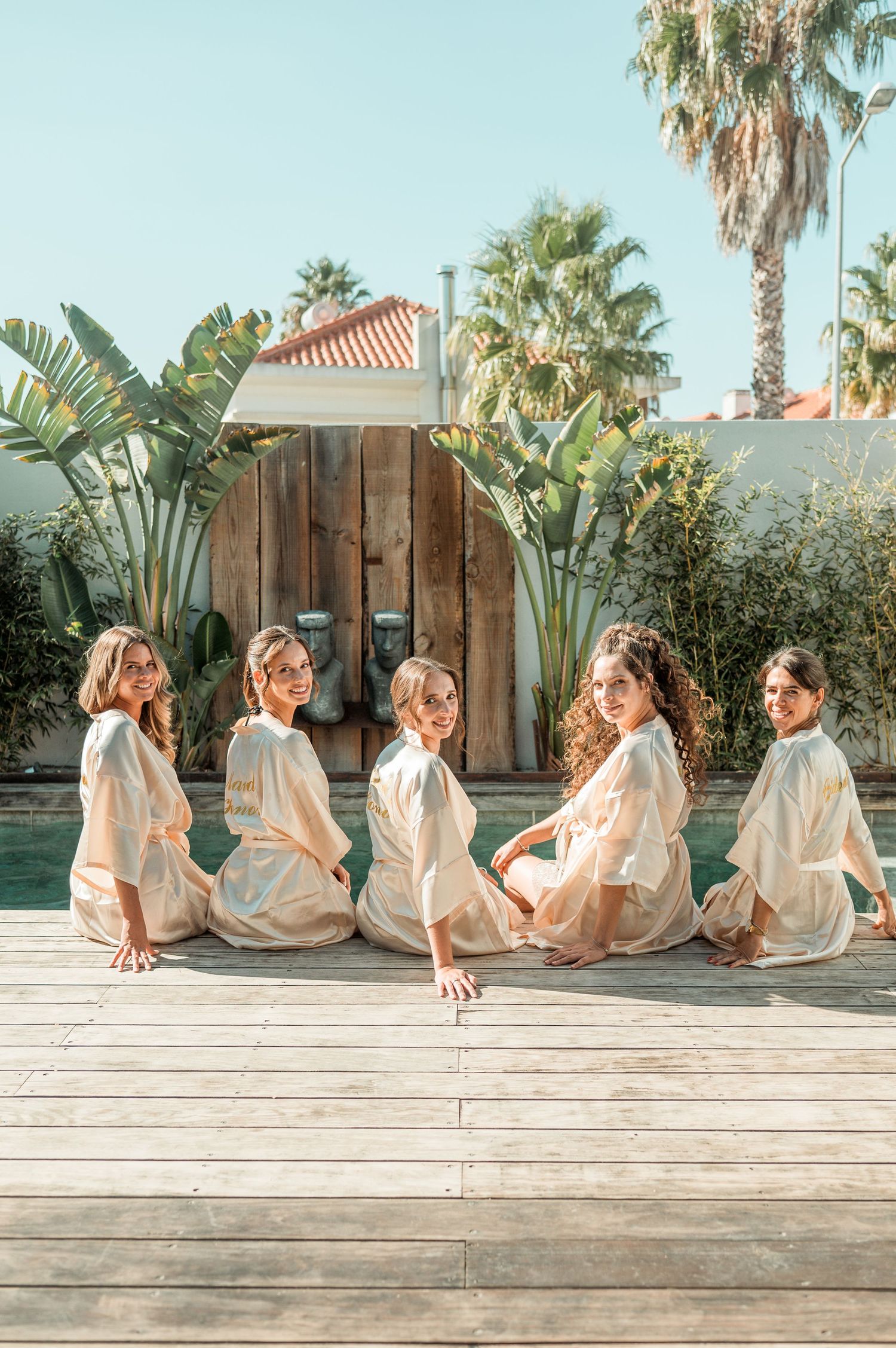 Bridesmaids during destination wedding preparations in Cascais, Portugal.