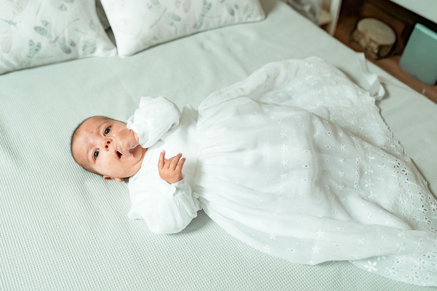 Baby baptism photography capturing natural and heartfelt family moments.