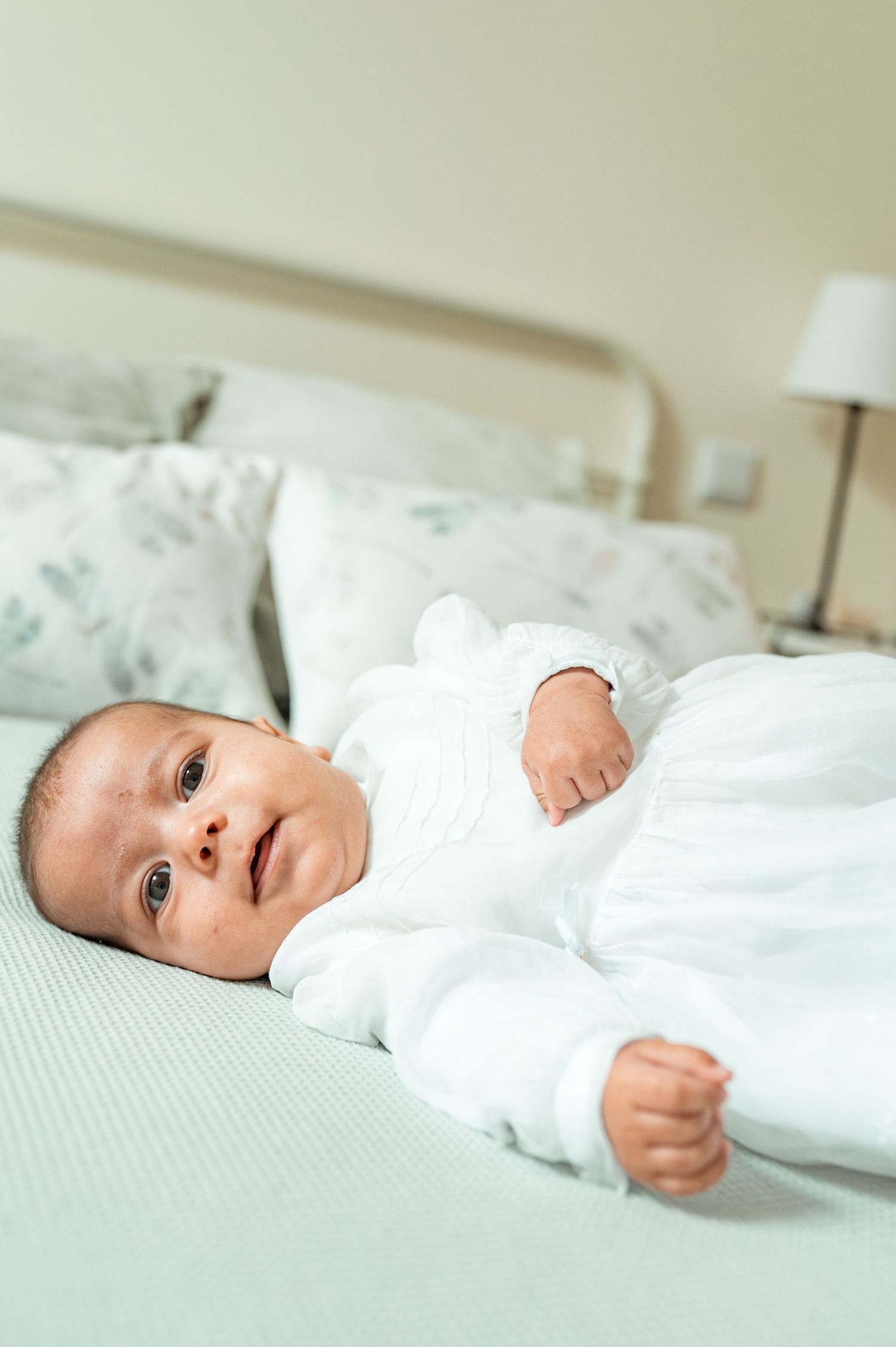 Baby baptism photography capturing natural and heartfelt family moments.