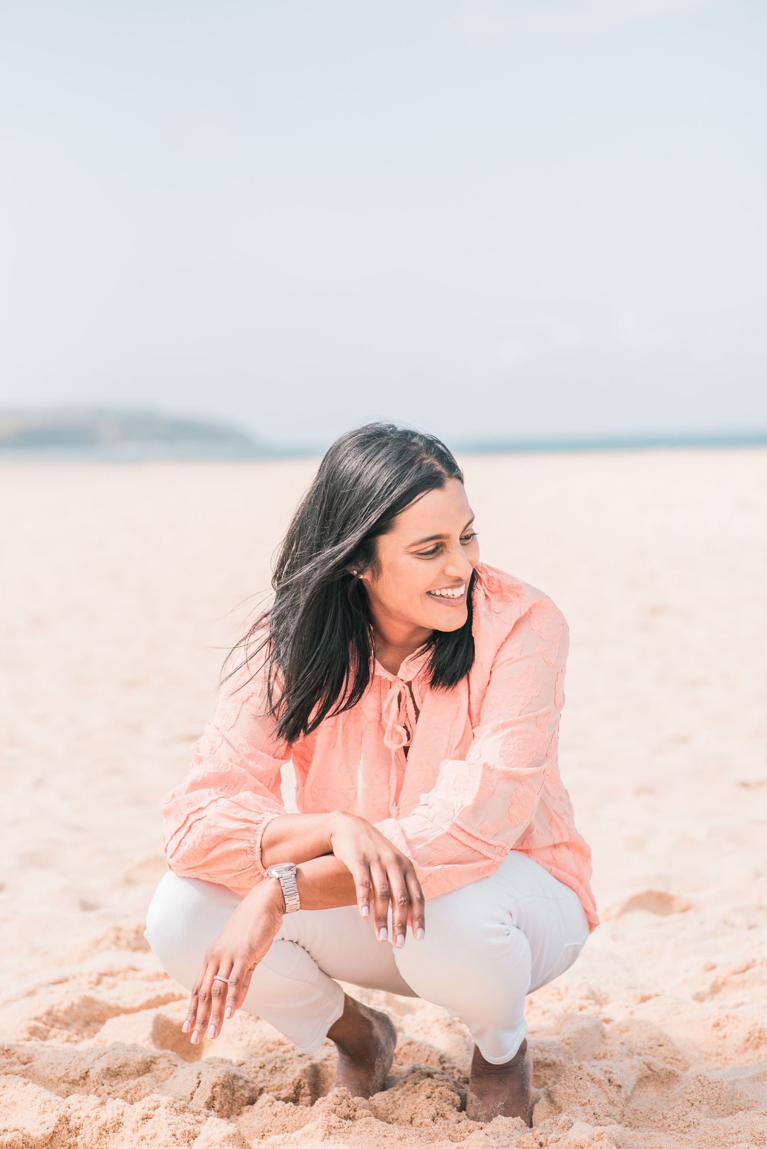 Natural and joyful family moments captured on a Portuguese beach.