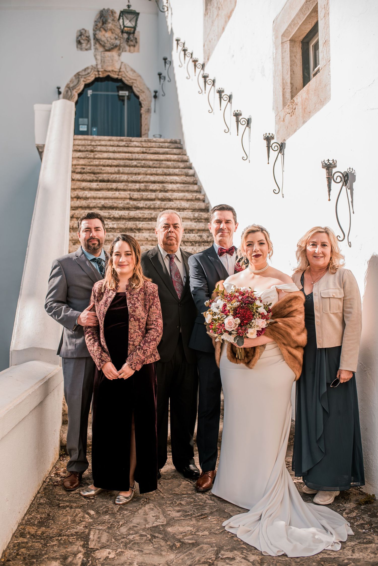 Intimate wedding ceremony at Pousada Castelo de Óbidos with emotional moments and warm atmosphere.