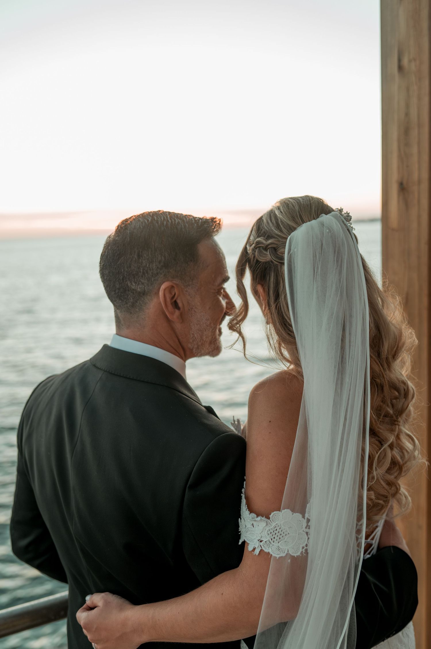 Romantic wedding portraits overlooking the ocean in Parede, Portugal.