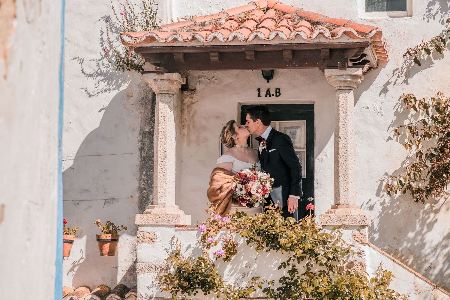 Romantic wedding portraits inside the medieval walls of Óbidos, Portugal.