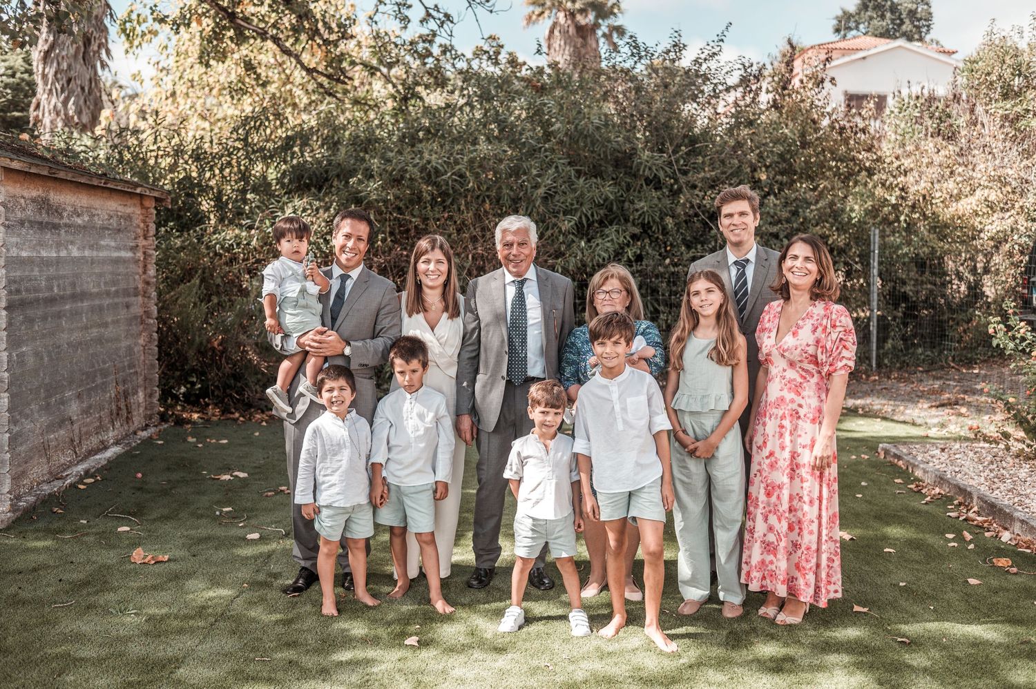 Emotional baptism celebration with family and close friends in Portugal.