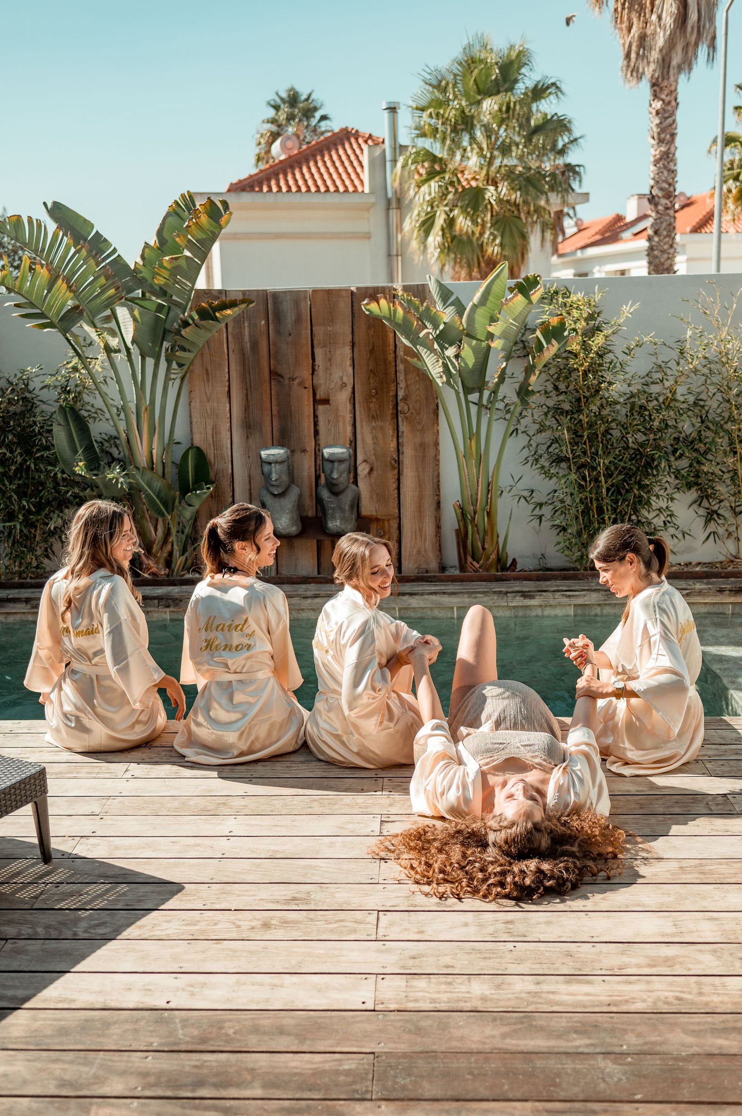 Bridesmaids during destination wedding preparations in Cascais, Portugal.