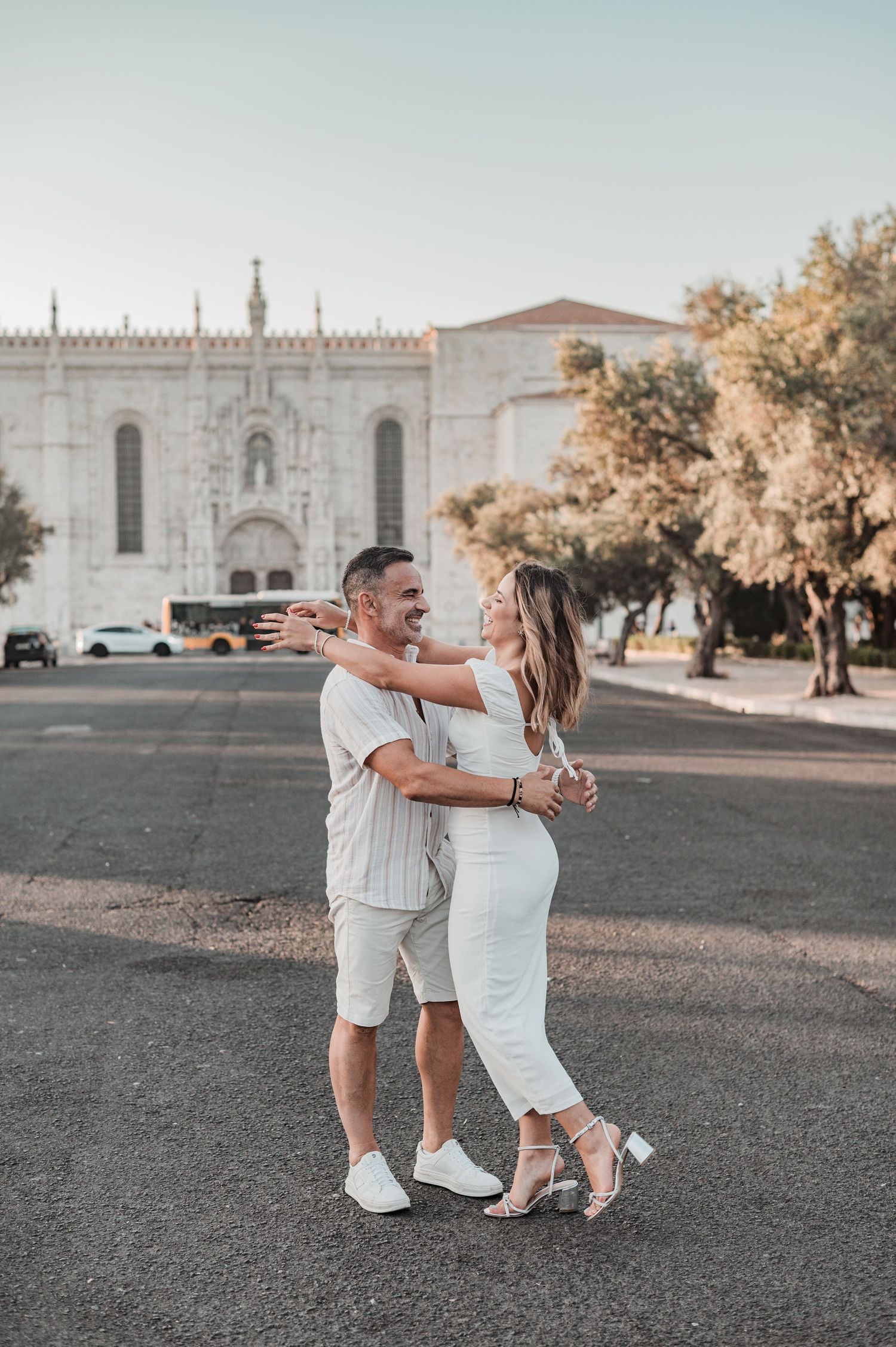 Pre-wedding photography in Belém, Lisbon, with candid moments of love and connection.