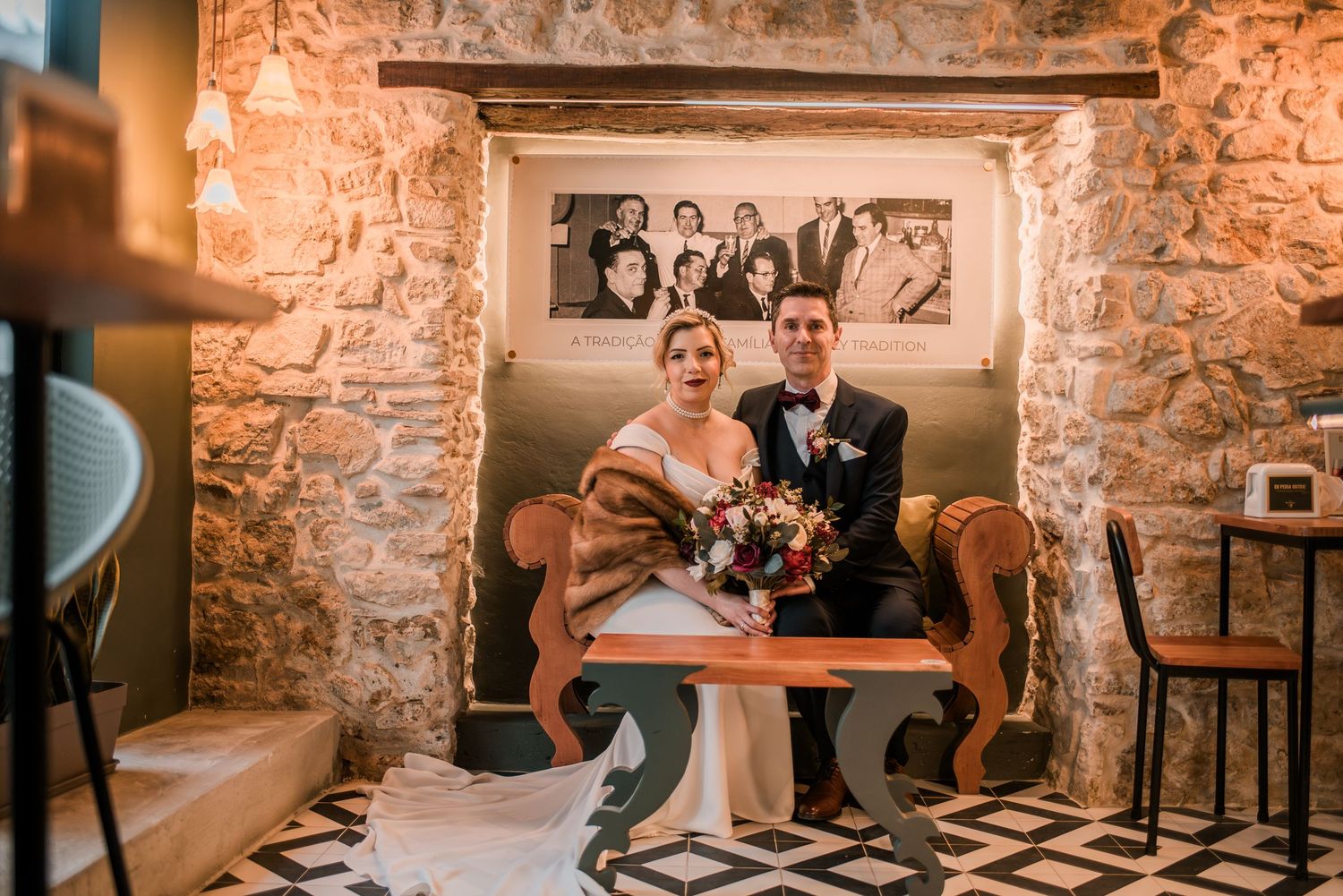 Destination wedding couple sharing a quiet moment in Óbidos, Portugal.