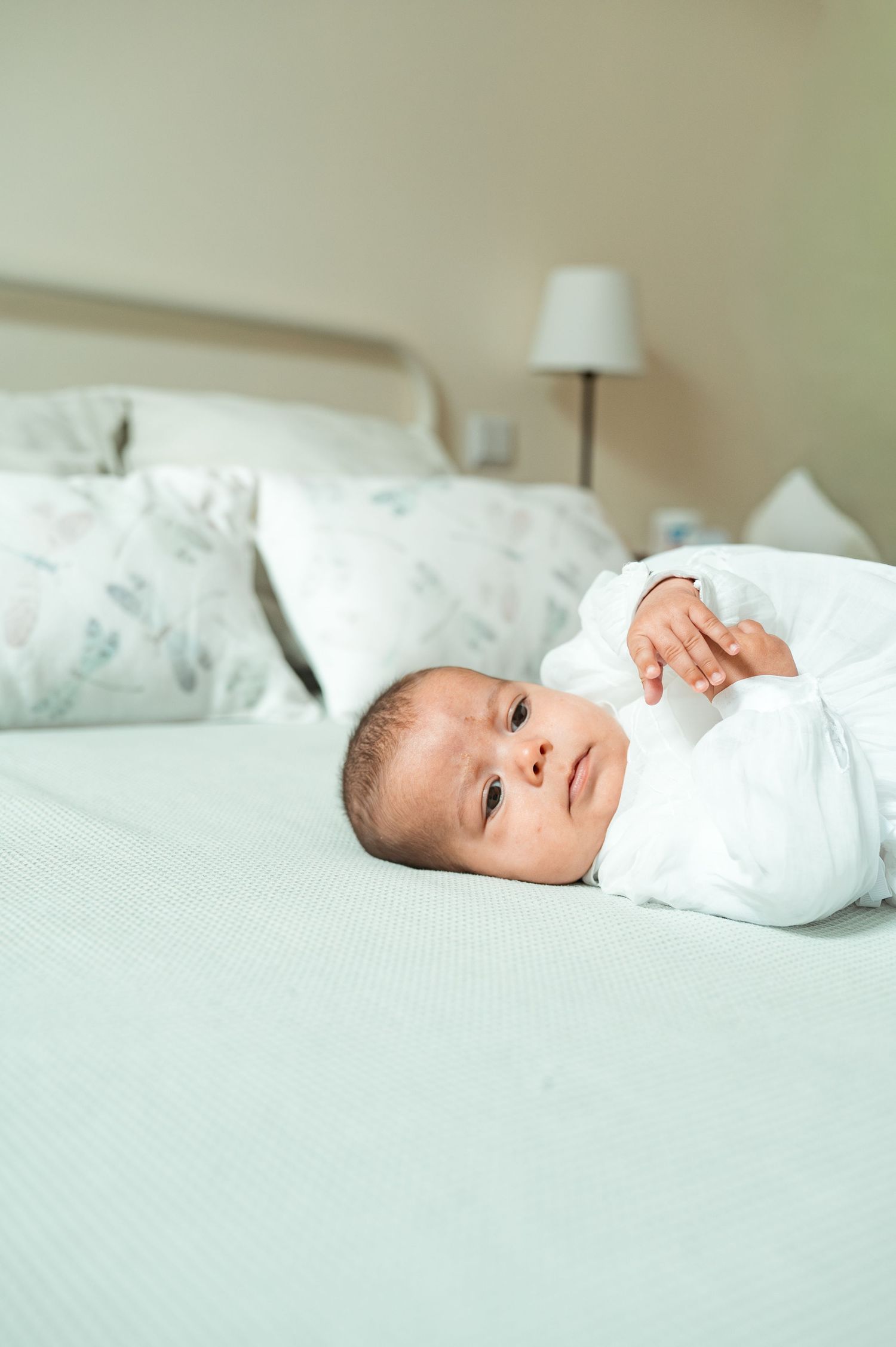 Baby baptism photography capturing natural and heartfelt family moments.