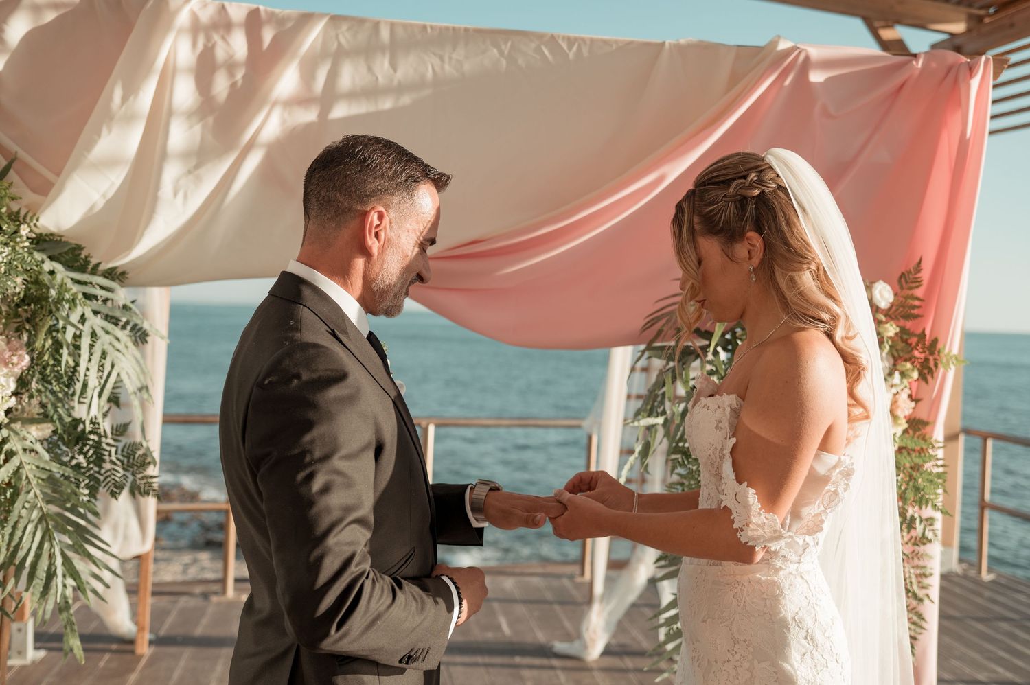 Romantic wedding portraits overlooking the ocean in Parede, Portugal.