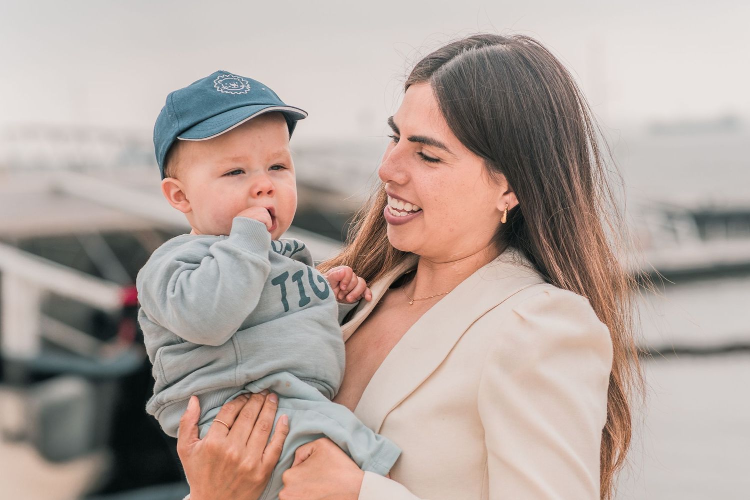 Parents and children sharing a joyful moment during a family session in Lisbon.