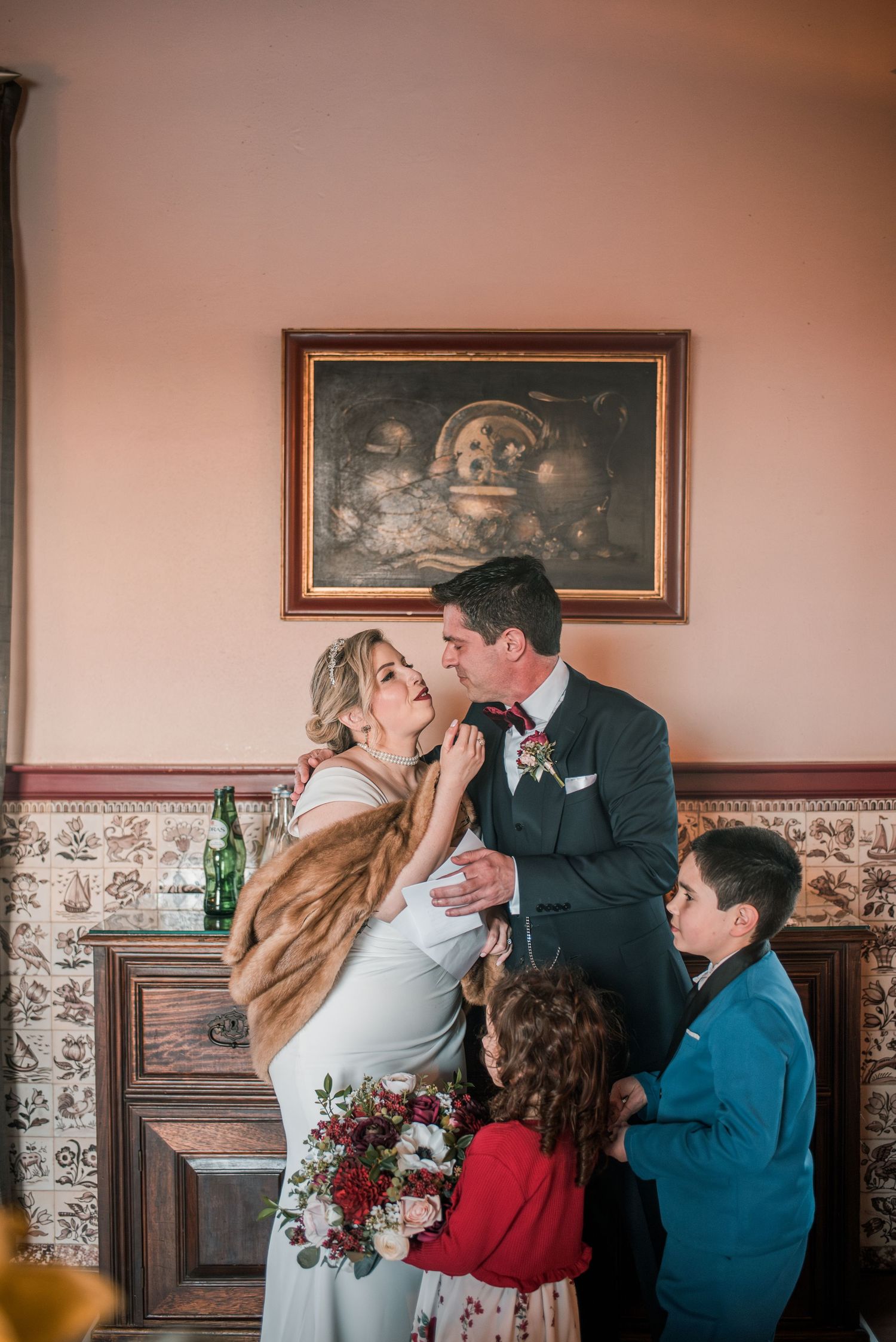 Destination wedding couple sharing a quiet moment in Óbidos, Portugal.