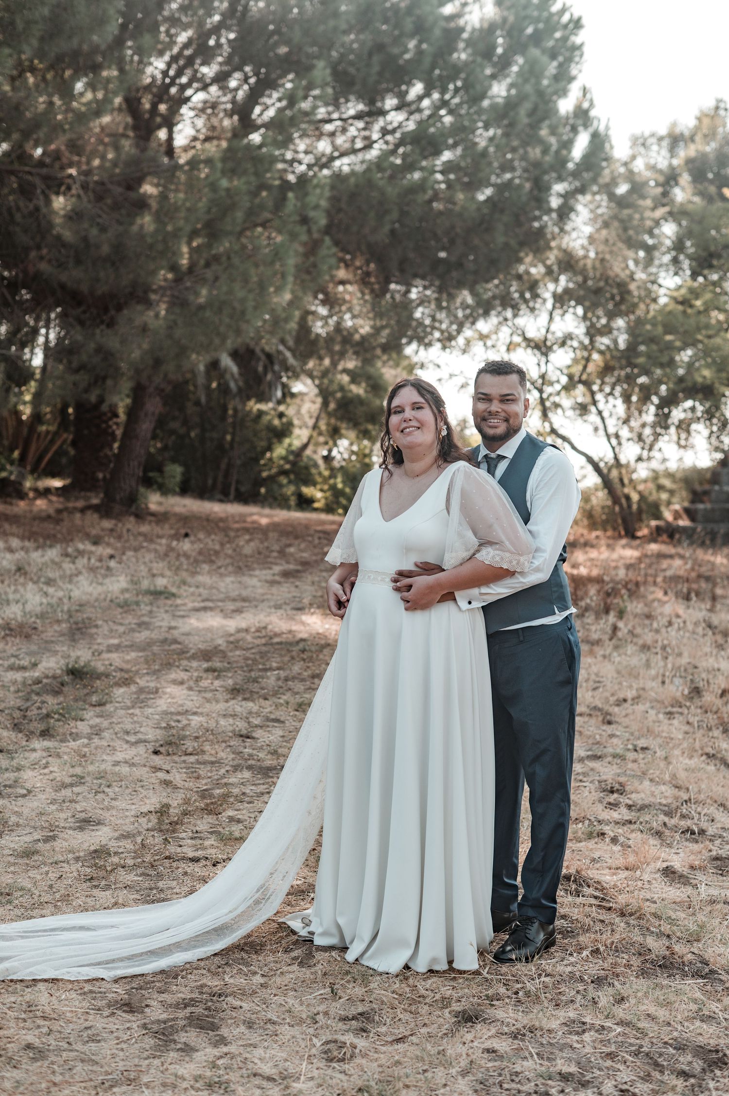 Intimate wedding portraits in Évora, Portugal, with warm Alentejo sunset light.