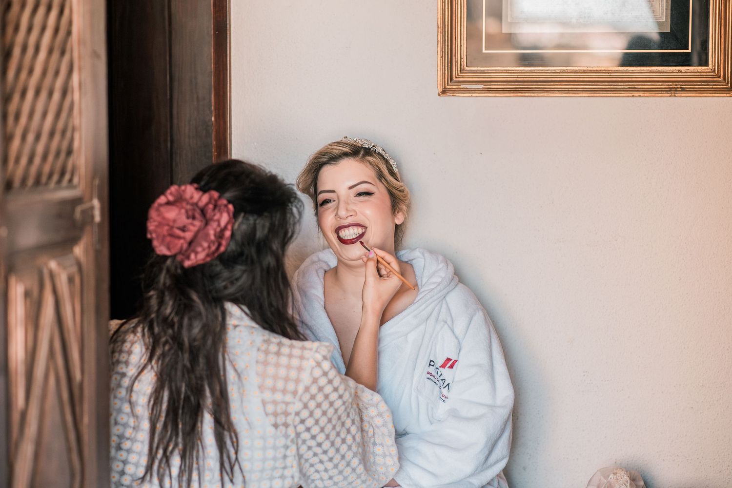 Elegant bride during destination wedding preparations in Óbidos, Portugal.