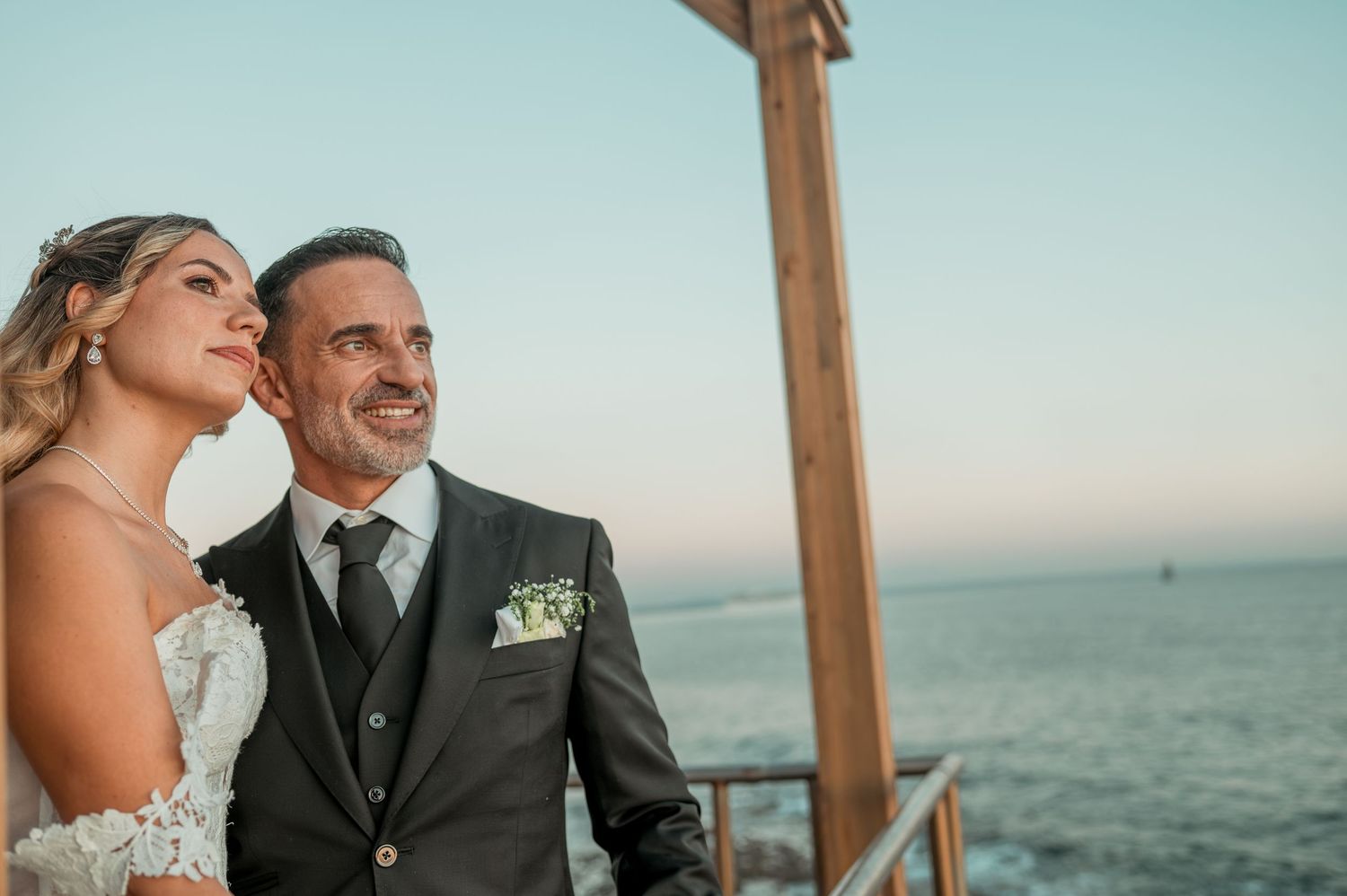 Romantic wedding portraits overlooking the ocean in Parede, Portugal.