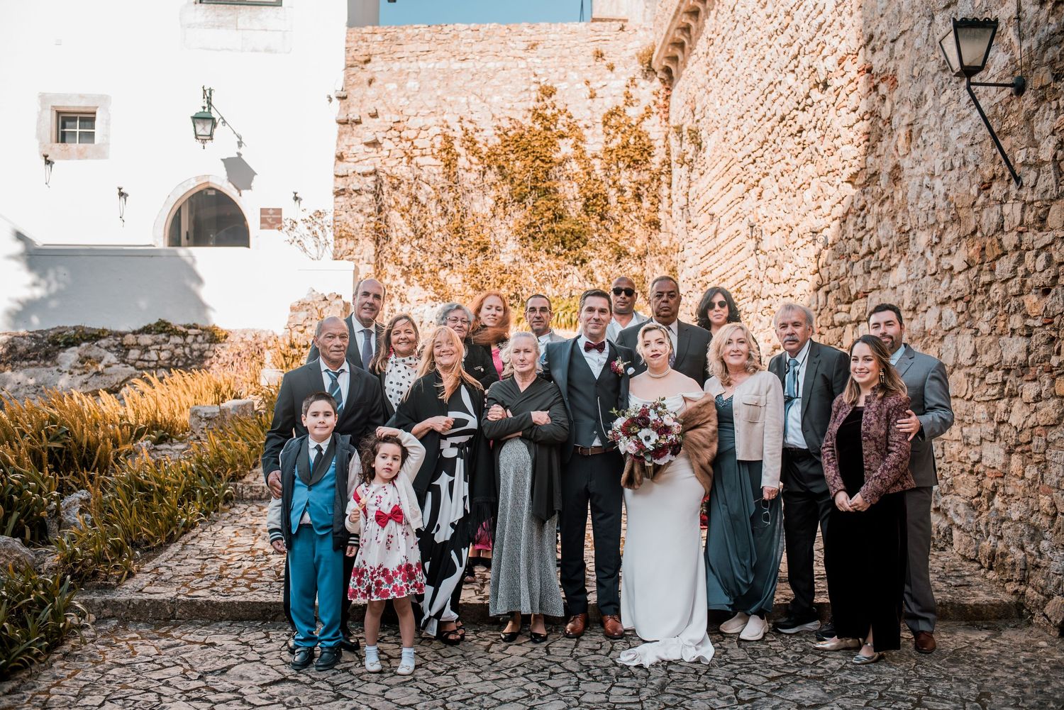 Intimate wedding ceremony at Pousada Castelo de Óbidos with emotional moments and warm atmosphere.