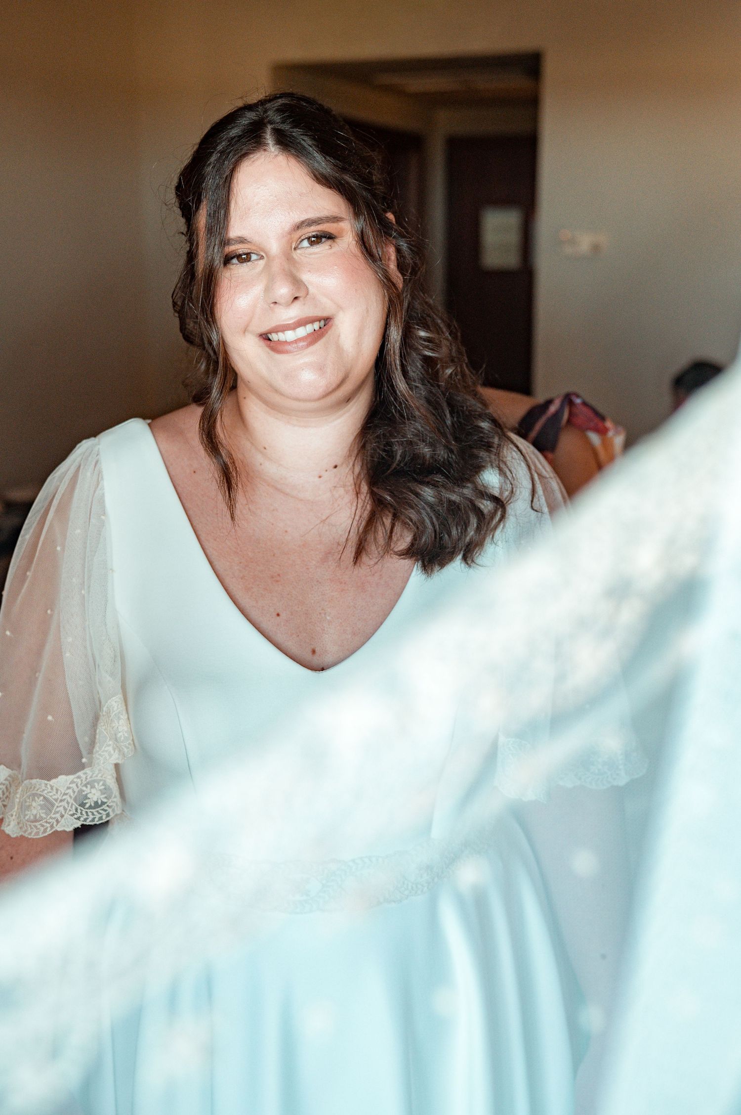Bride in her wedding preparation in the historic center of Évora, Portugal.