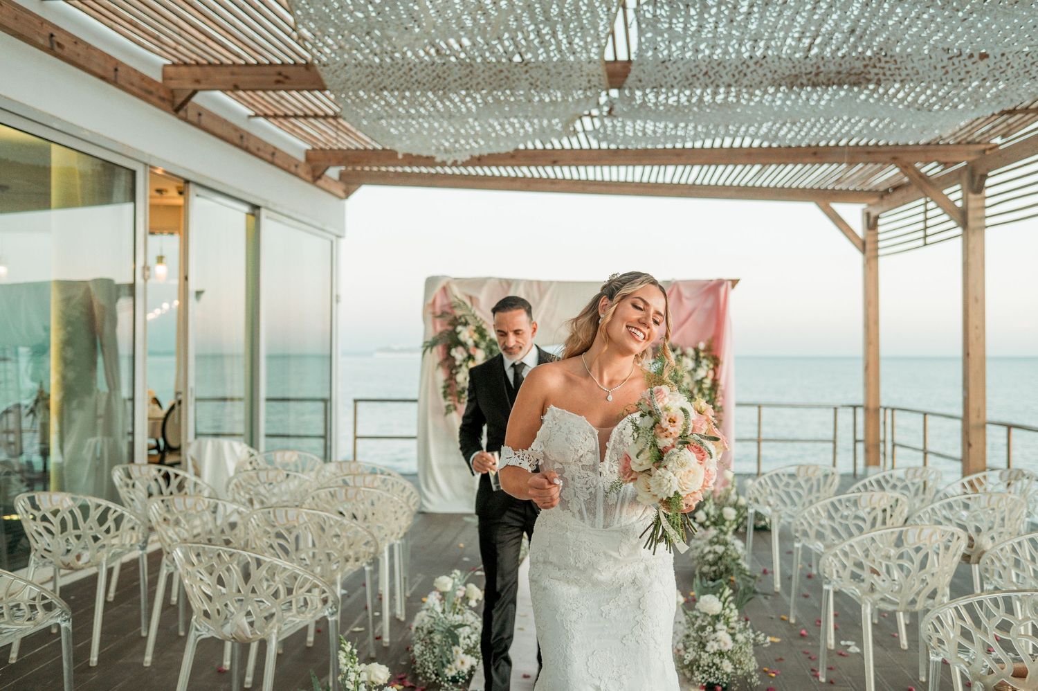 Romantic wedding portraits overlooking the ocean in Parede, Portugal.
