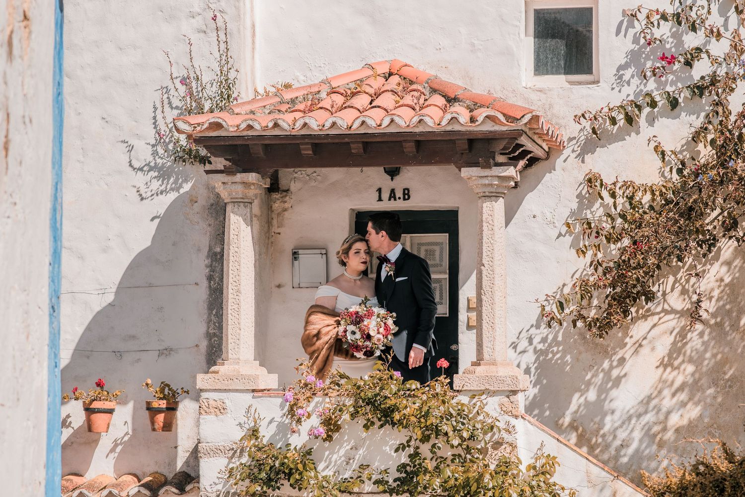 Romantic wedding portraits inside the medieval walls of Óbidos, Portugal.