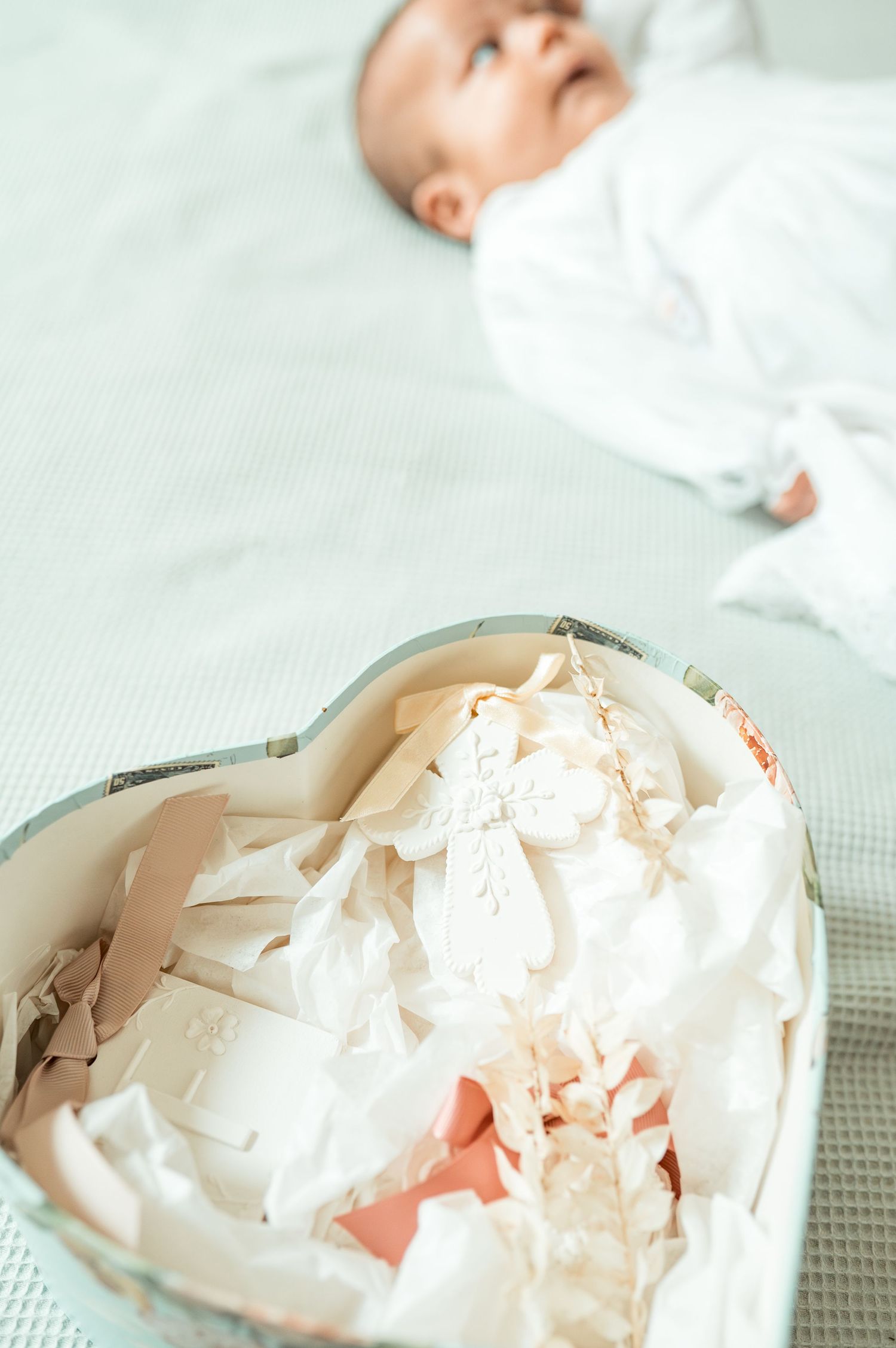 Baby baptism photography capturing natural and heartfelt family moments.