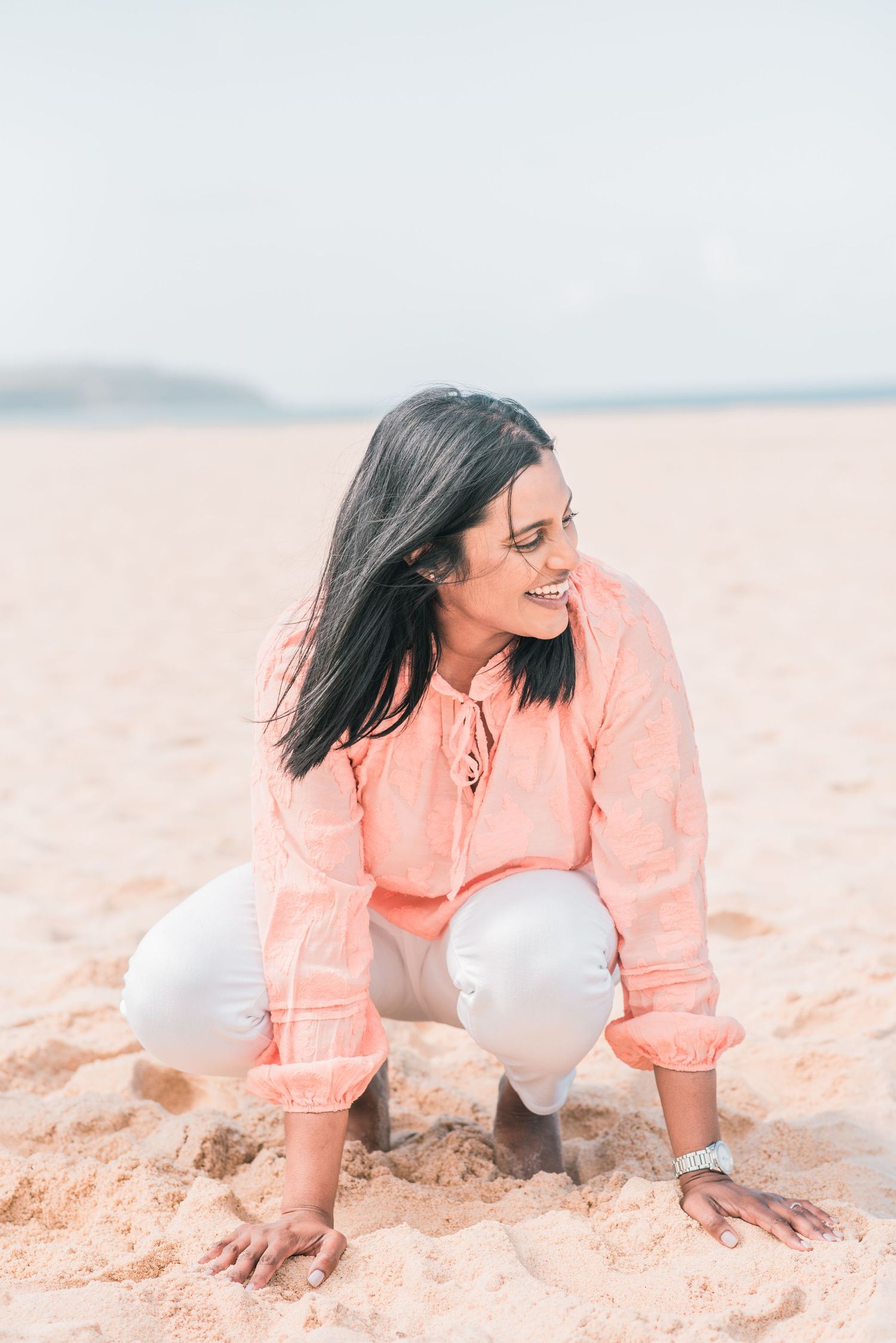 Natural and joyful family moments captured on a Portuguese beach.
