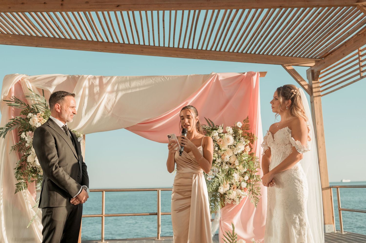 Romantic wedding portraits overlooking the ocean in Parede, Portugal.