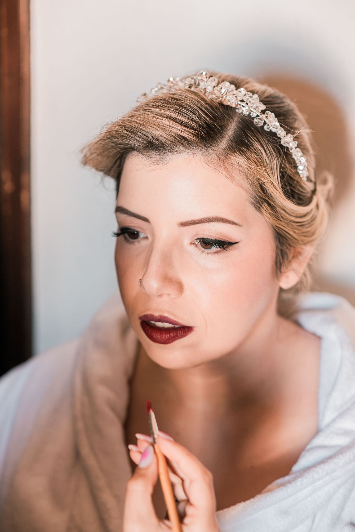 Elegant bride during destination wedding preparations in Óbidos, Portugal.
