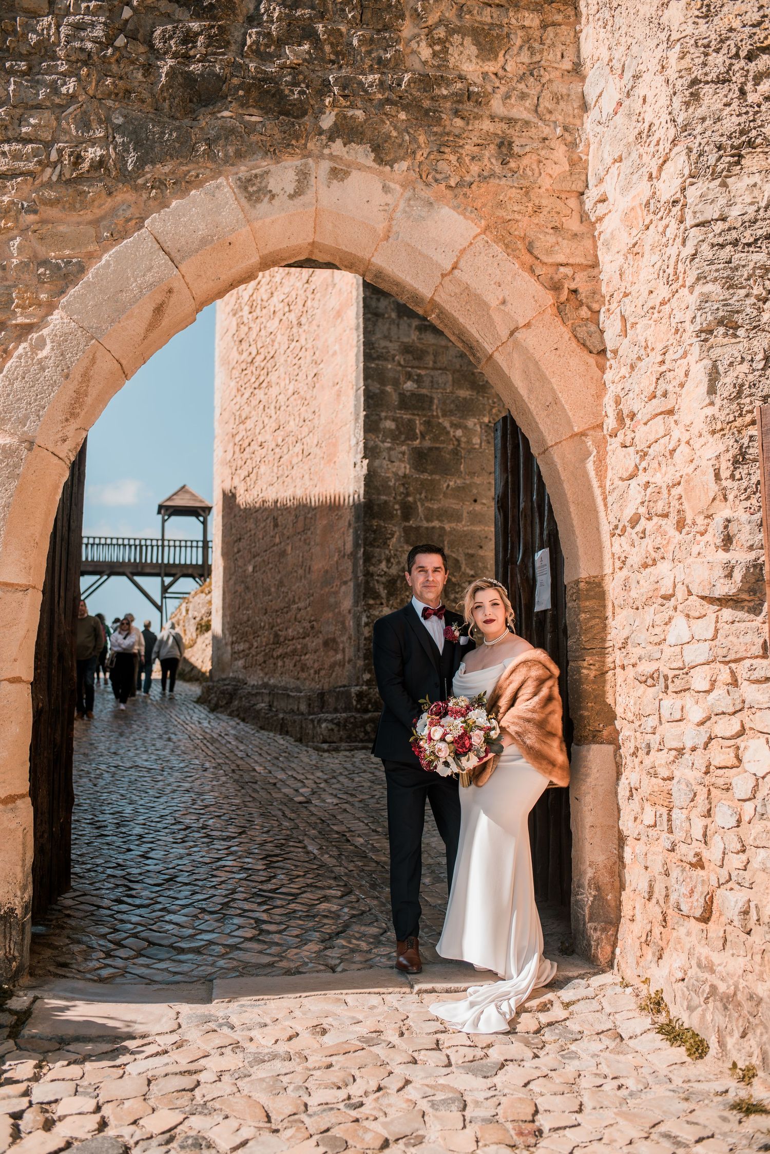 Intimate wedding ceremony at Pousada Castelo de Óbidos with emotional moments and warm atmosphere.
