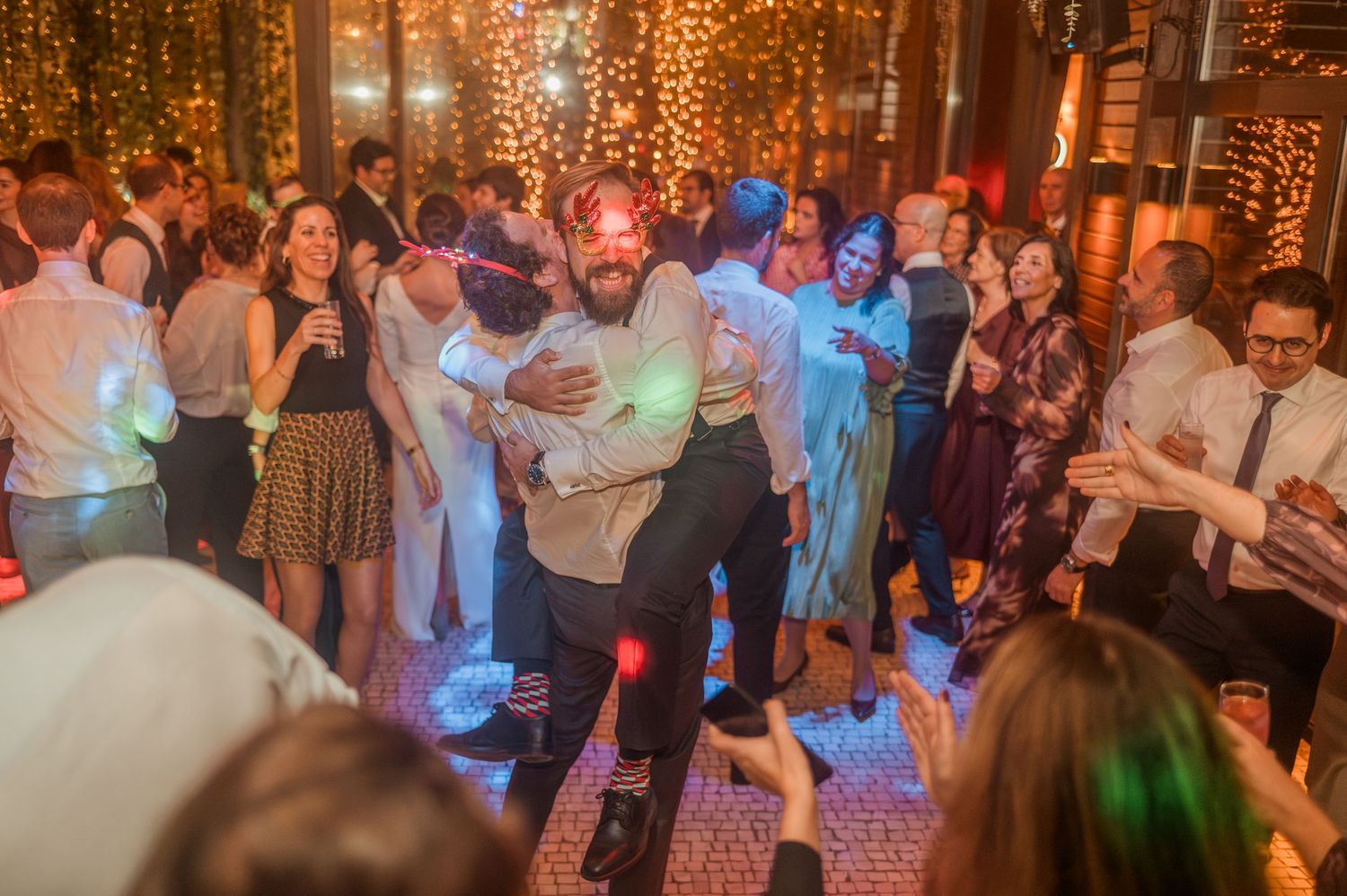 Winter wedding in Porto, Portugal, with Christmas lights and festive decorations in December.