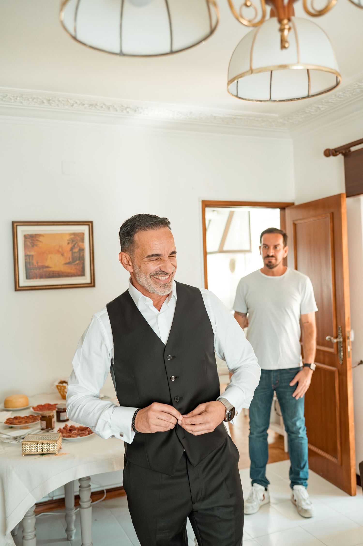 Elegant groom during destination wedding preparations in Cascais, Portugal.