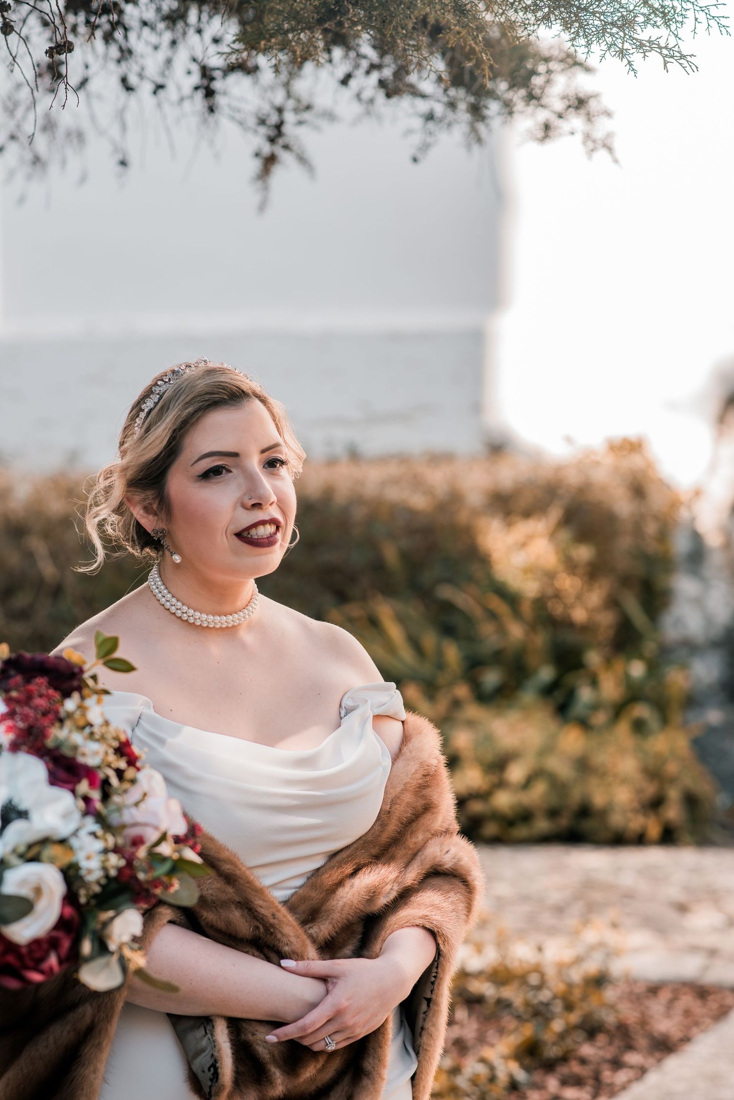 Elegant bride during destination wedding preparations in Óbidos, Portugal.