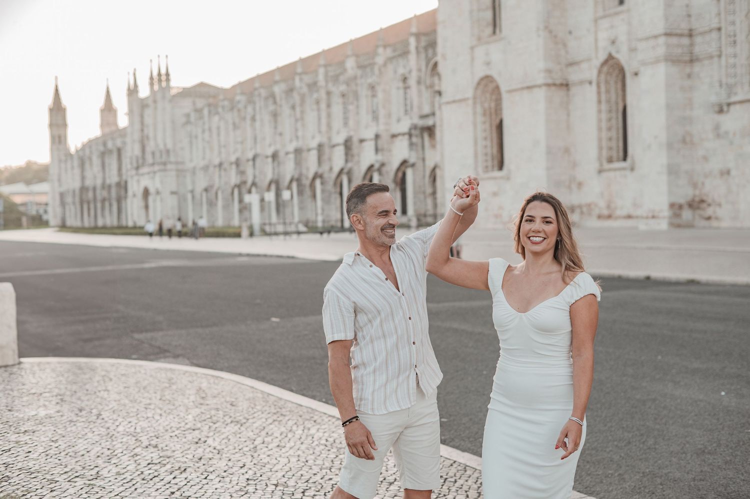 Pre-wedding photography in Belém, Lisbon, with candid moments of love and connection.