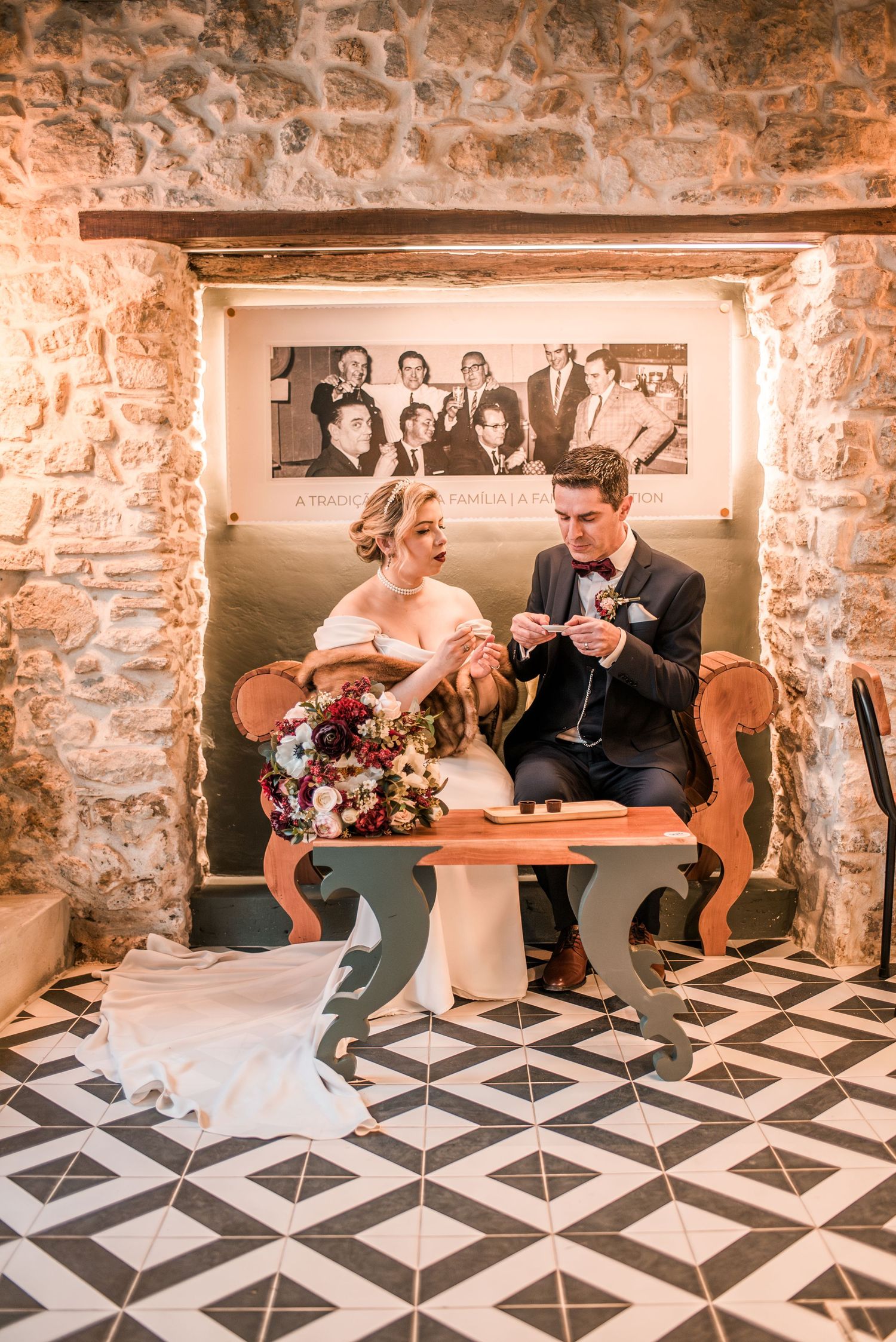 Destination wedding couple sharing a quiet moment in Óbidos, Portugal.