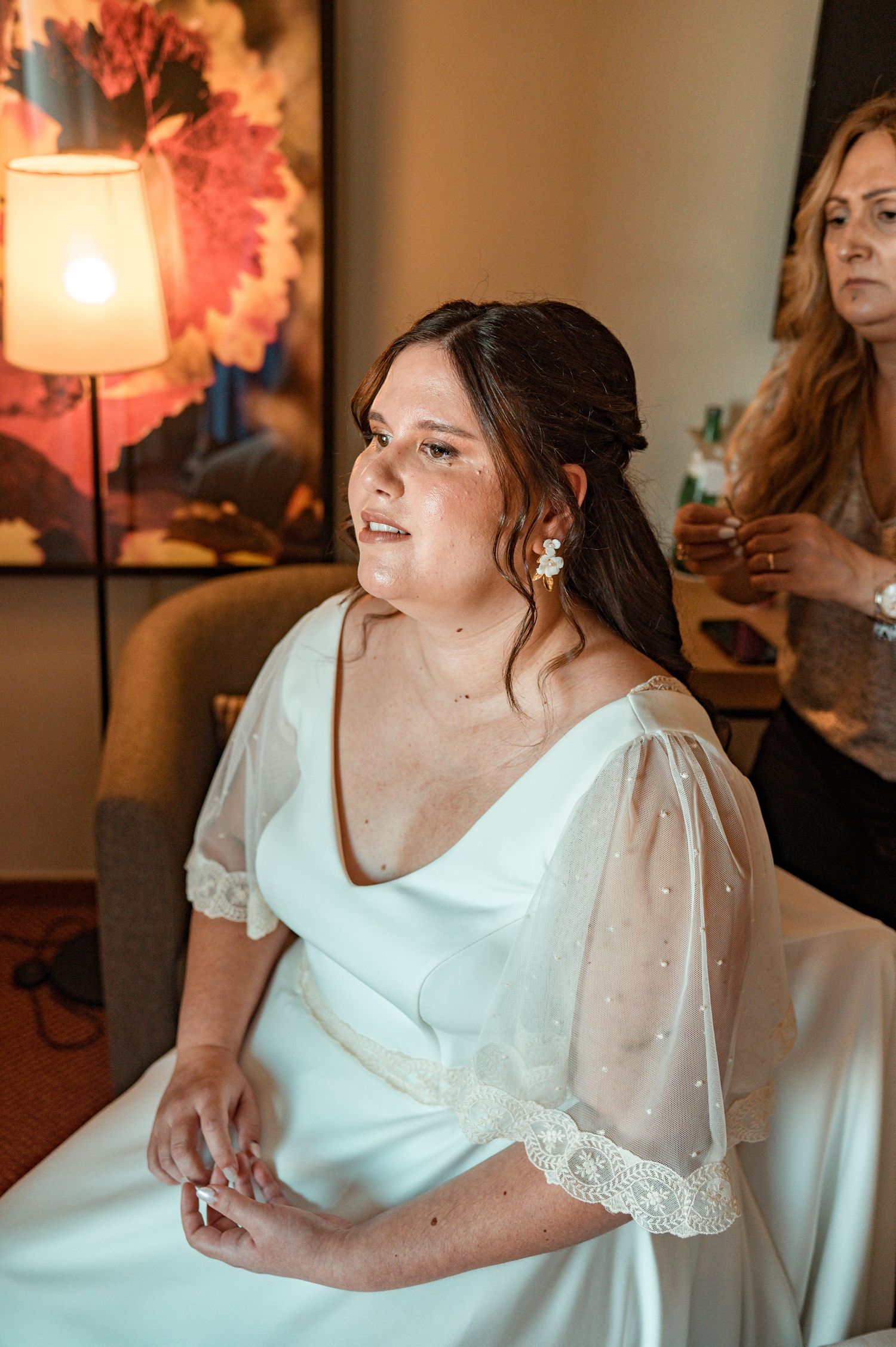 Bride in her wedding preparation in the historic center of Évora, Portugal.