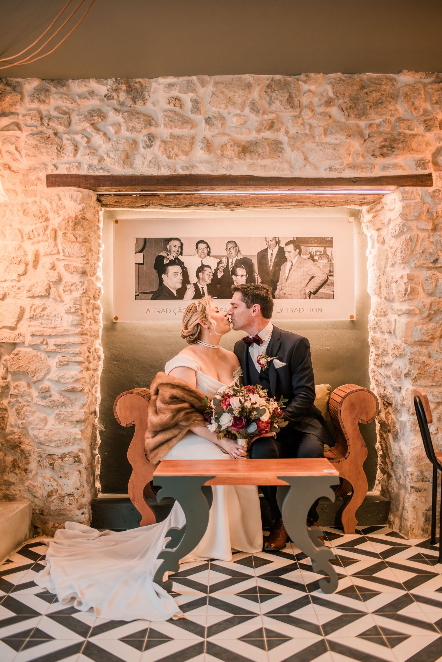 Destination wedding couple sharing a quiet moment in Óbidos, Portugal.