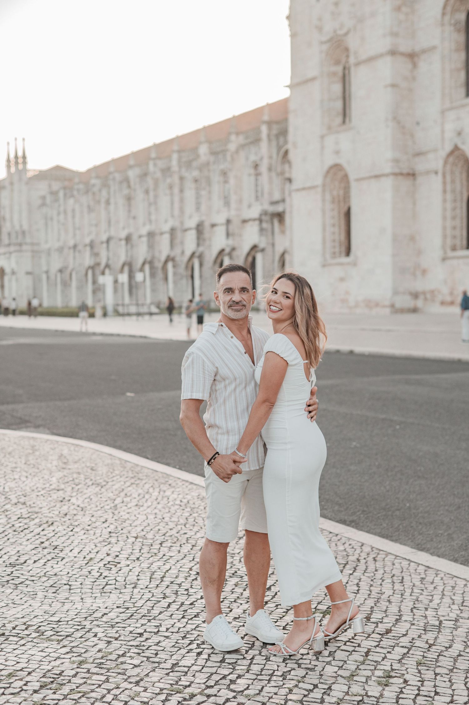 Pre-wedding photography in Belém, Lisbon, with candid moments of love and connection.