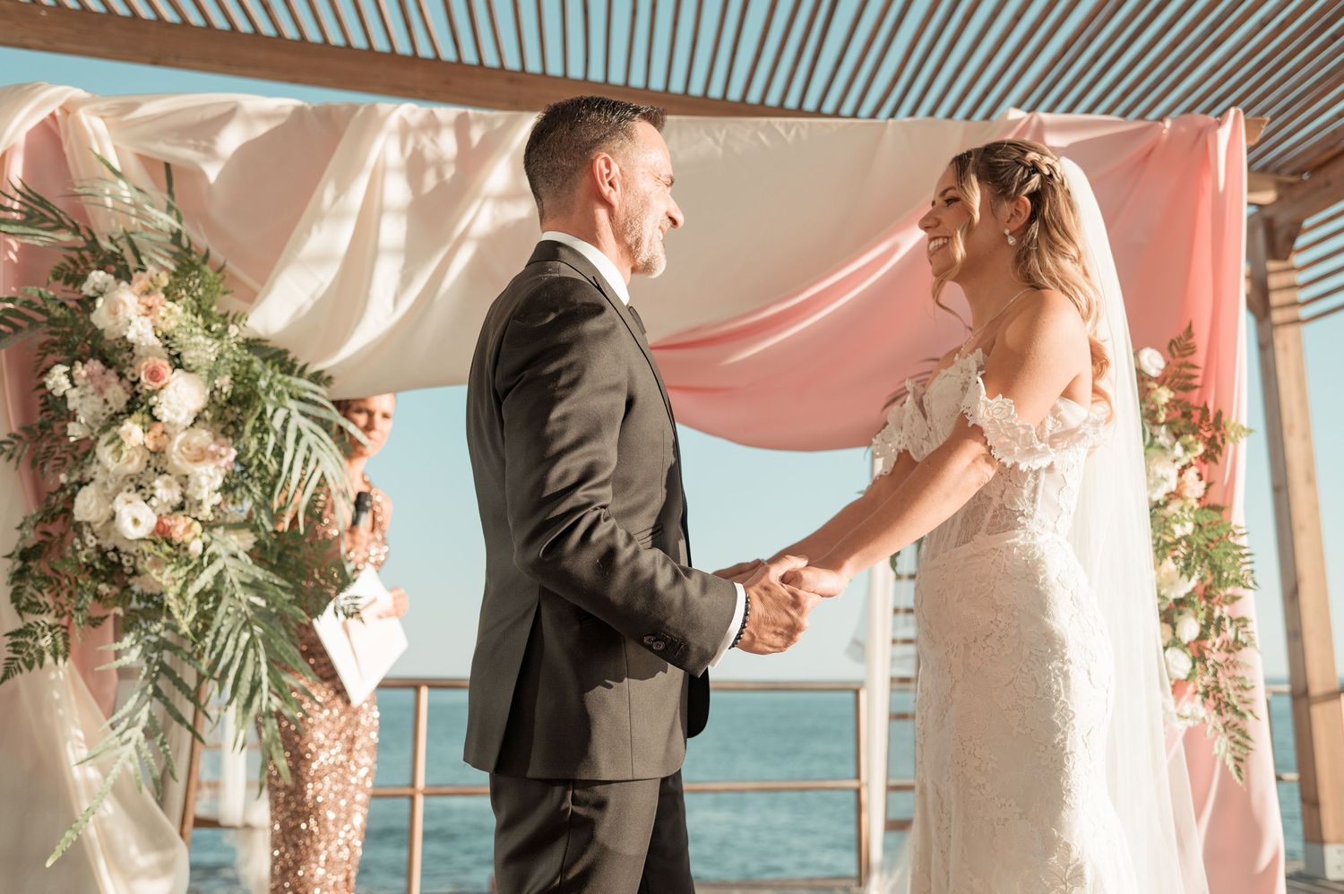 Romantic wedding portraits overlooking the ocean in Parede, Portugal.