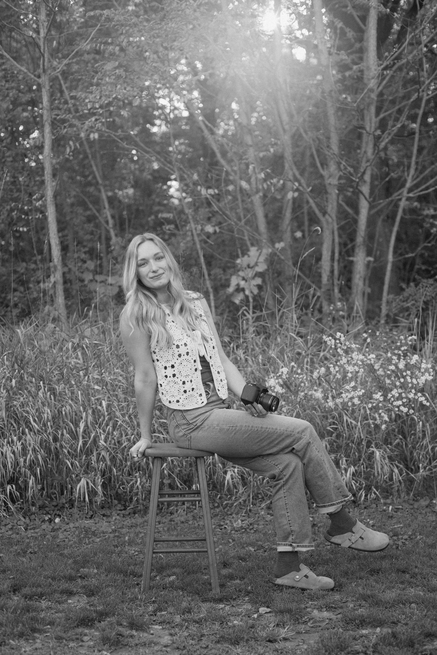 Solo shot of Eden, West Michigan Photographer, in black and white.