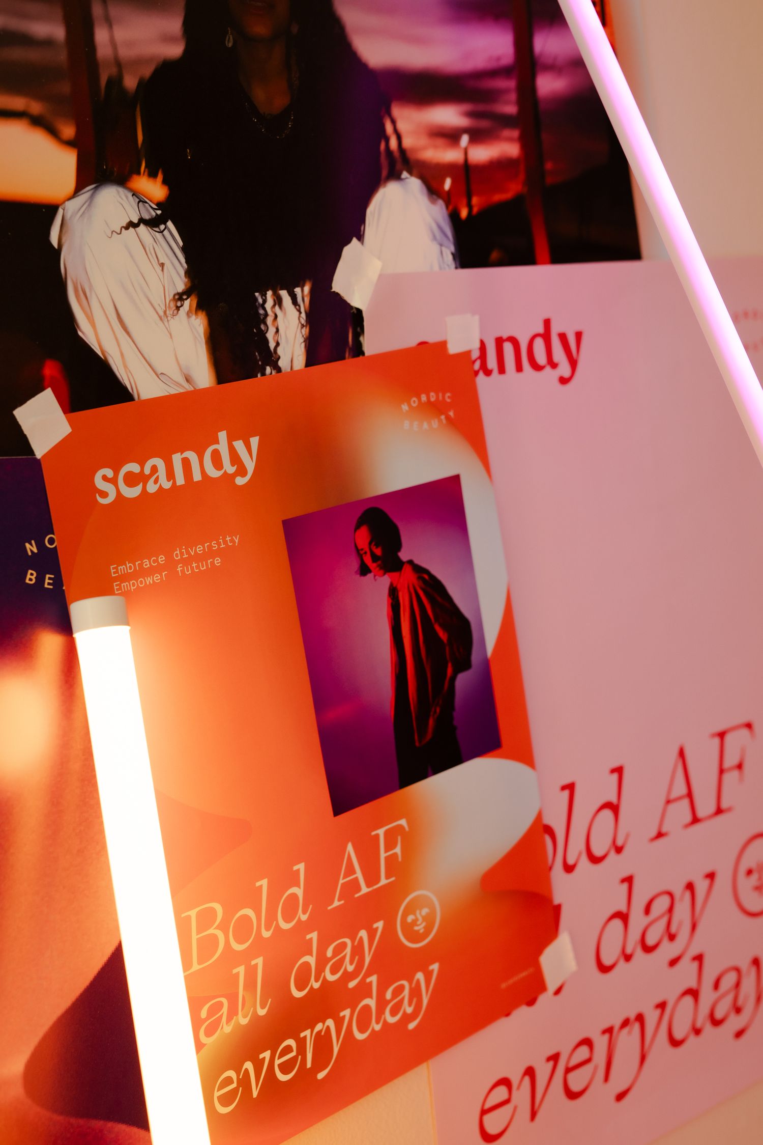 Scandy brand marketing materials showing pink-tinted photos and text reading 