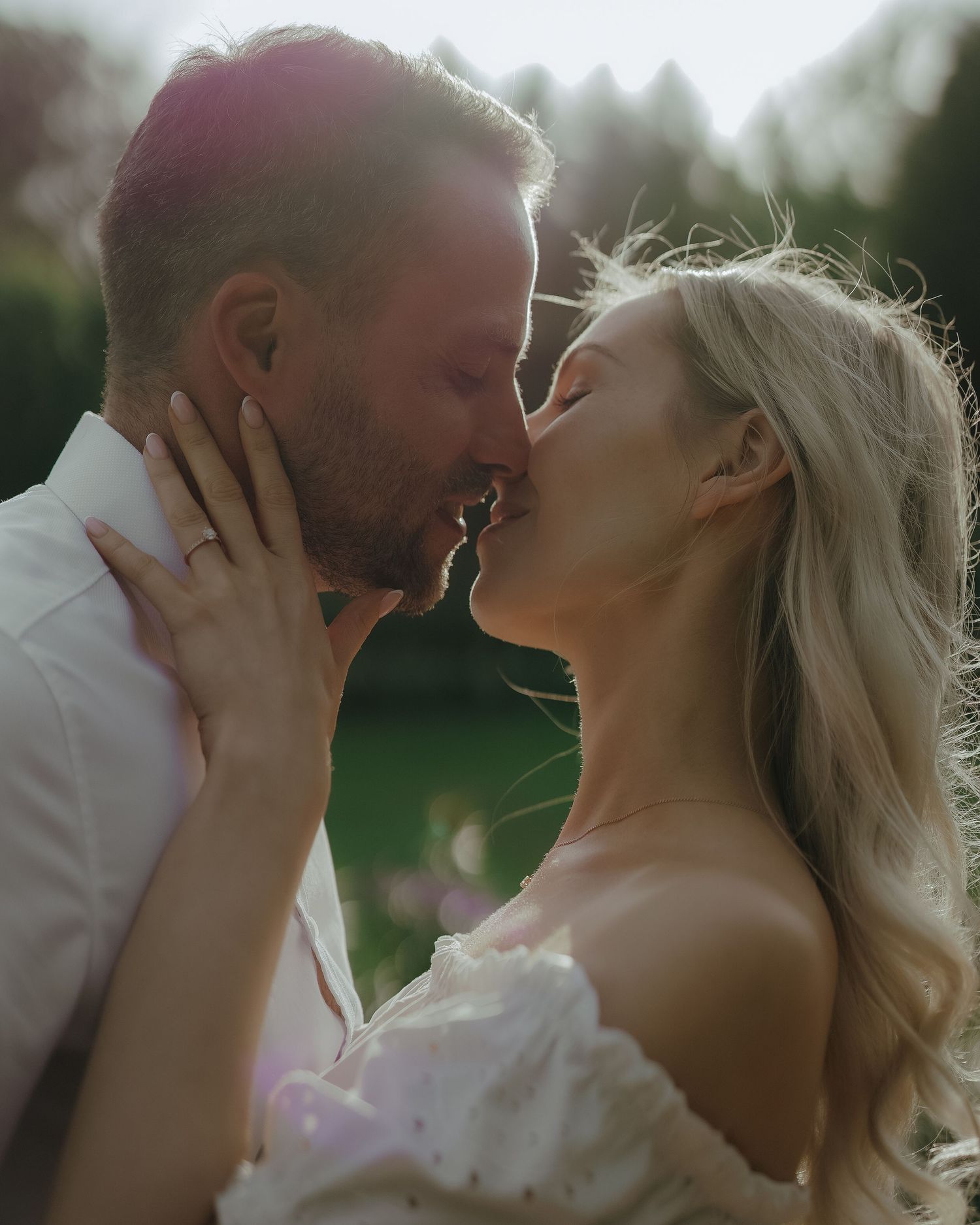 A tender kiss captured in five consecutive shots showing the emotional connection between a couple outdoors.