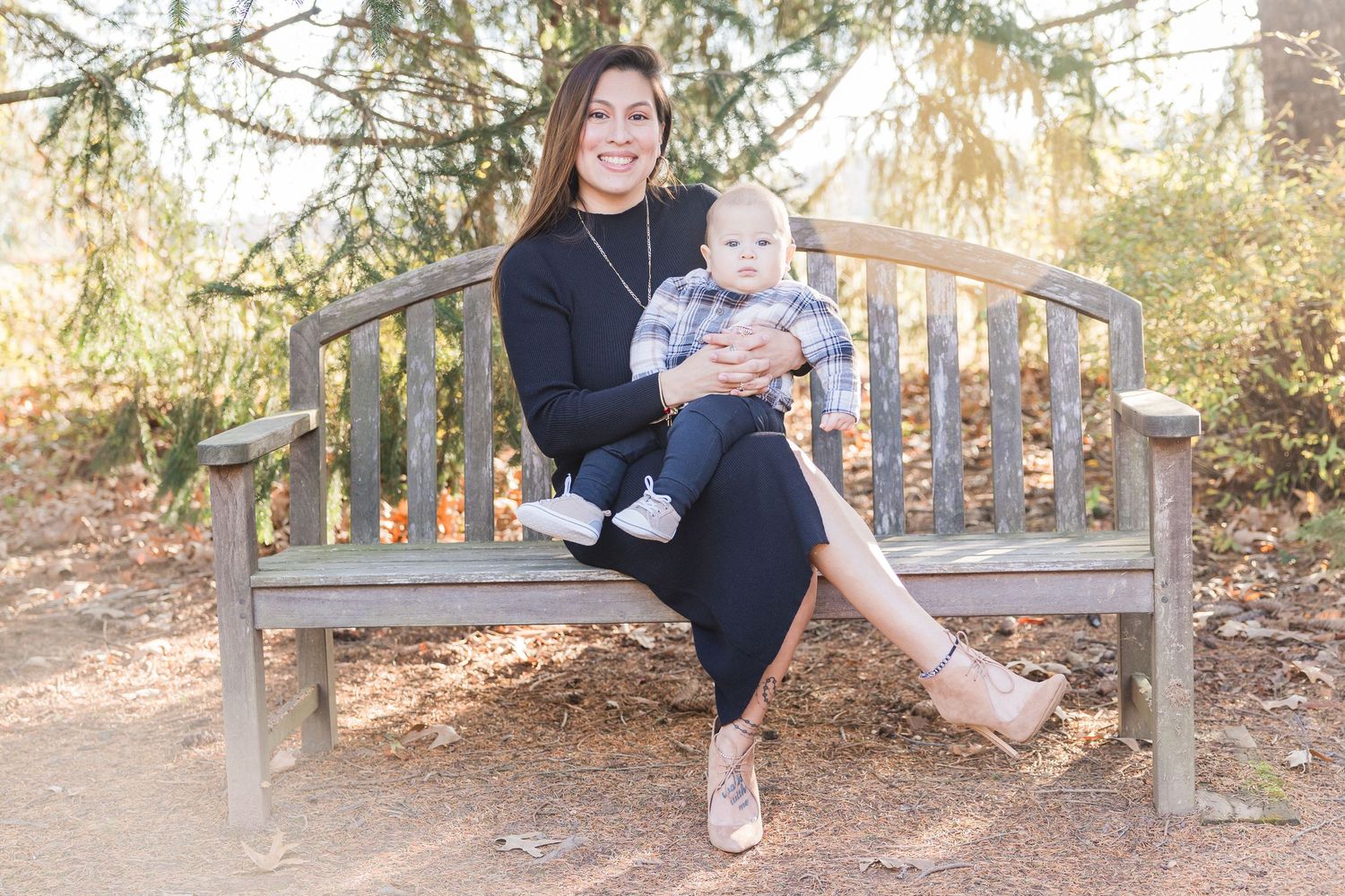 A sequence of candid moments captured on a wooden park bench in warm sunlight during an outdoor photo session.