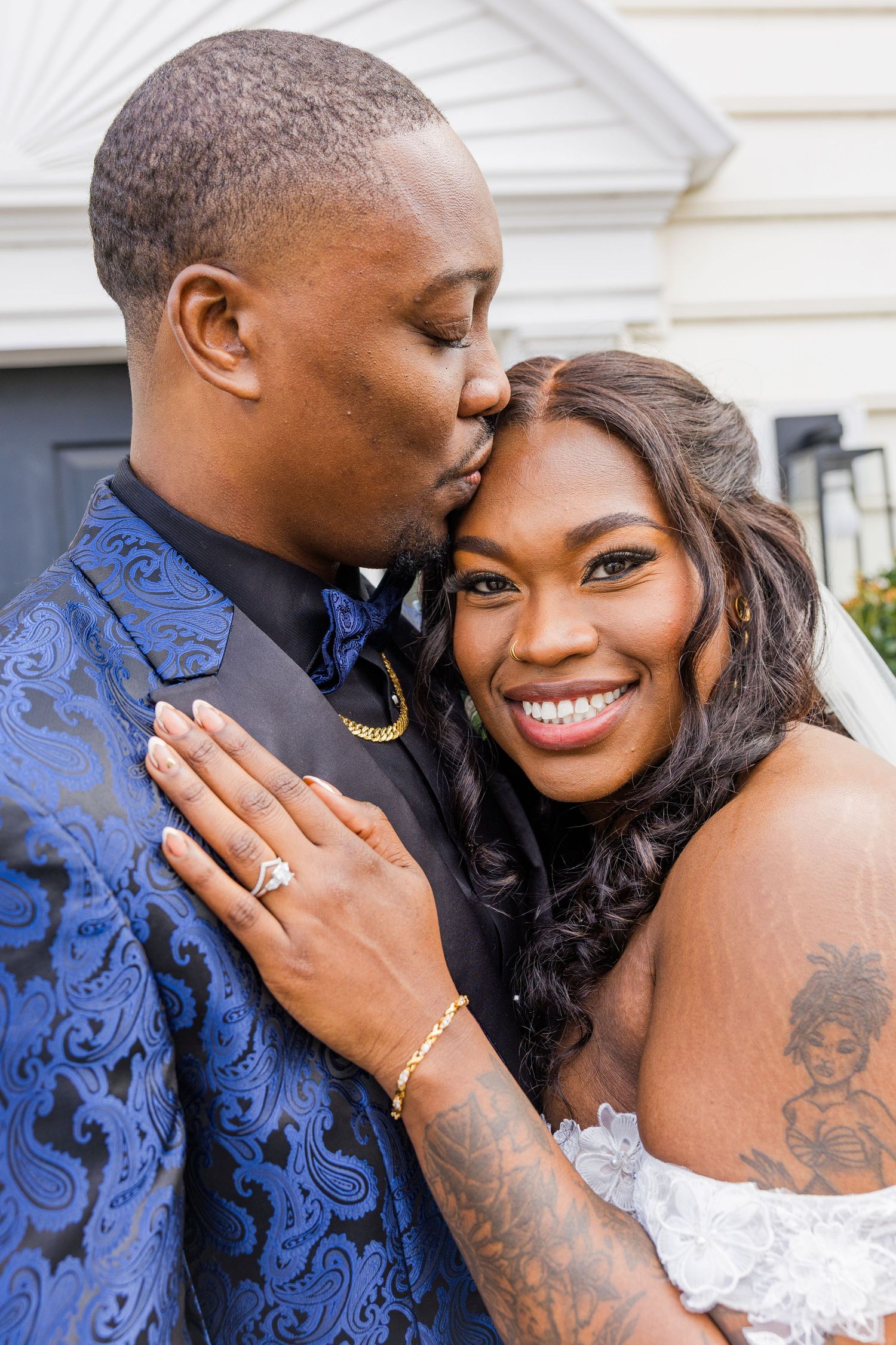 A romantic wedding couple shares intimate moments in a series of close-up photos wearing blue and white attire.