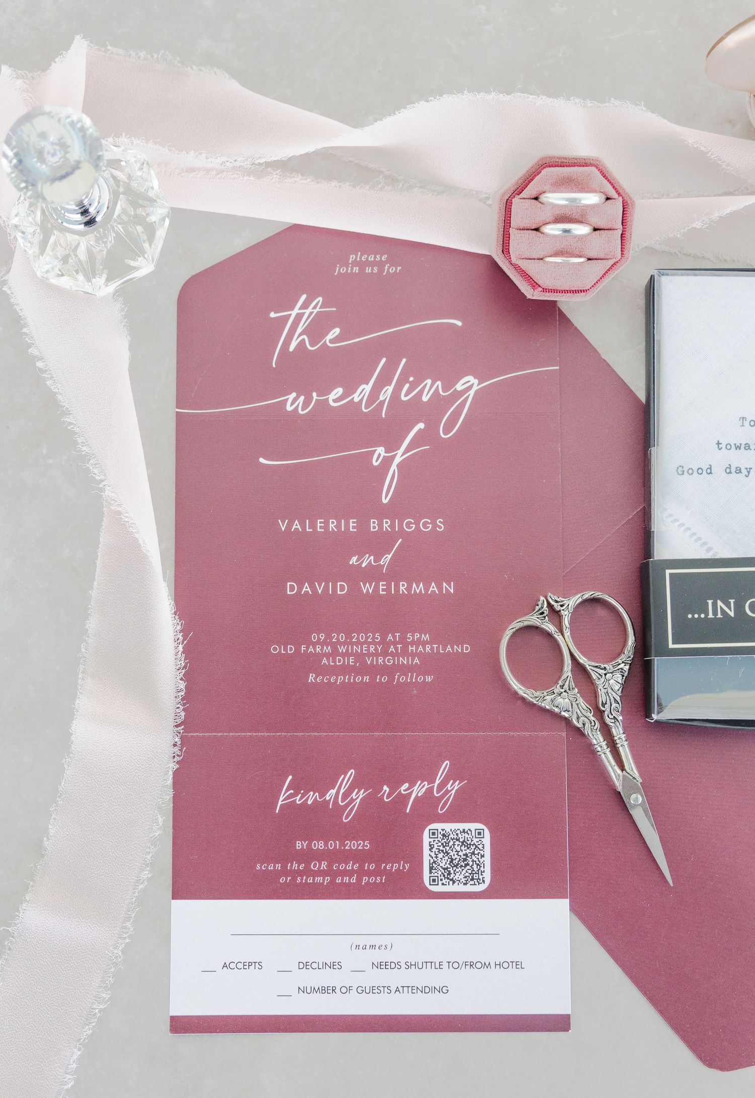 Wedding invitation suite featuring mauve tones, calligraphy and decorative scissors.