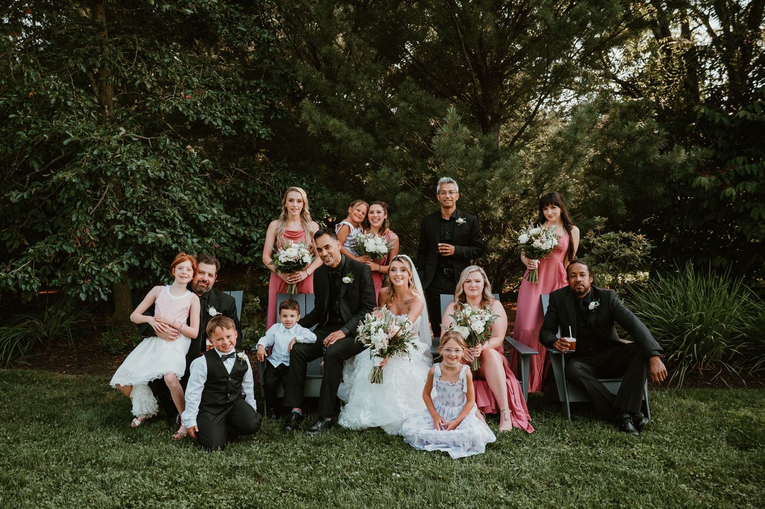 A series of outdoor wedding party photos taken in a lush green garden setting during golden hour.