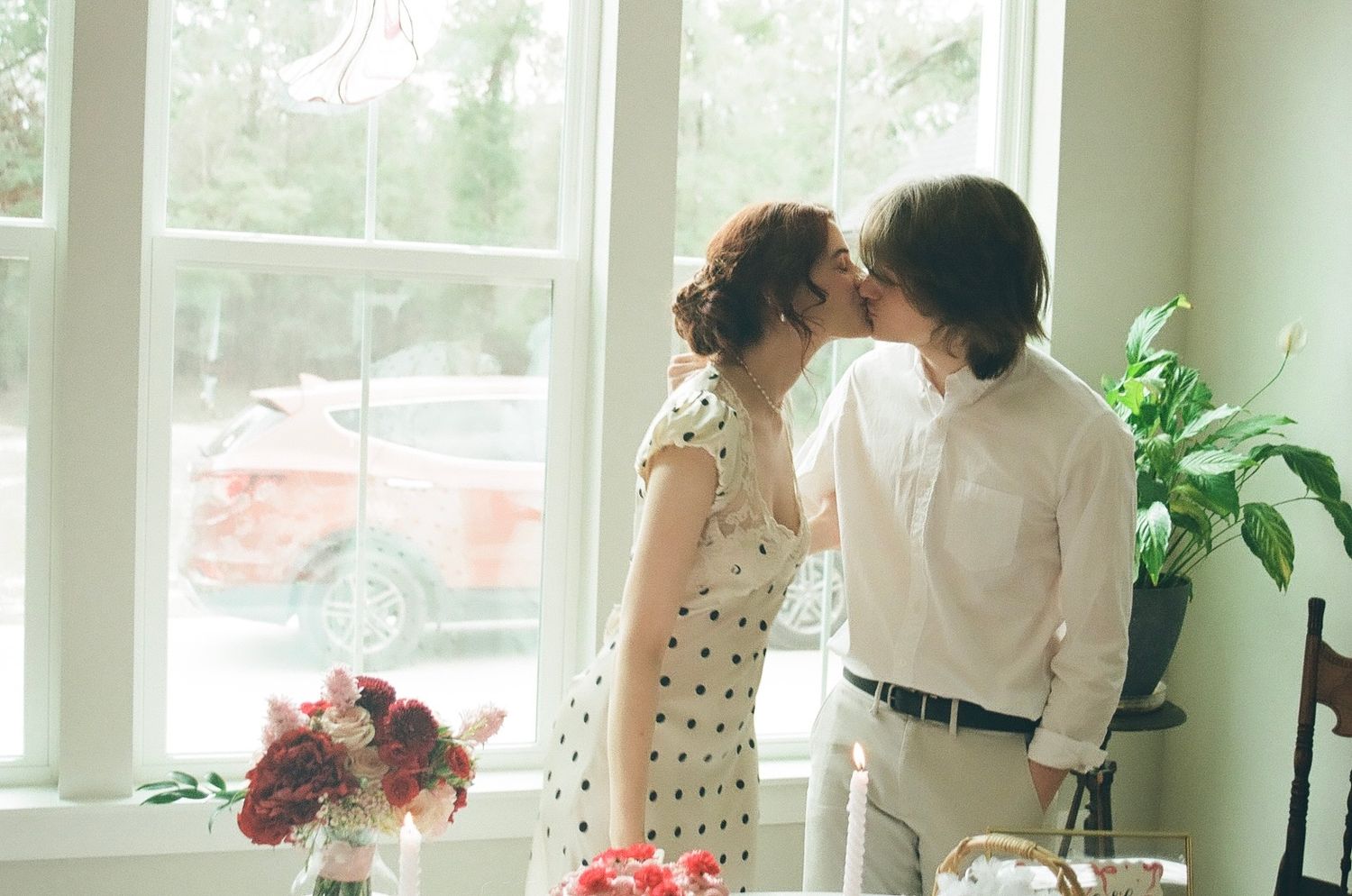 couple kissing at wedding